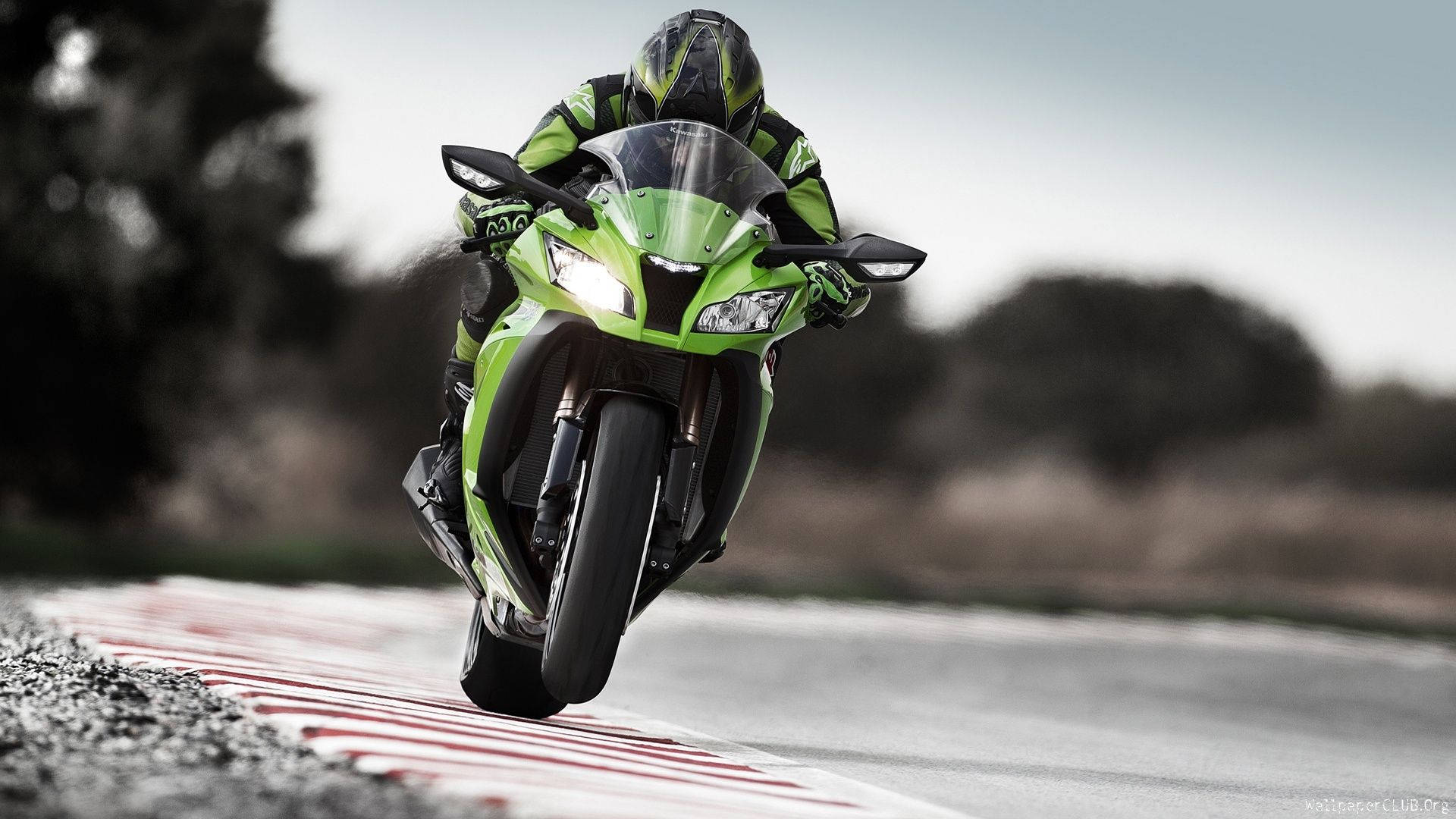 Ready, Set, Go! Get This Racing Green Kawasaki Ninja And Take It For A Spin. Background