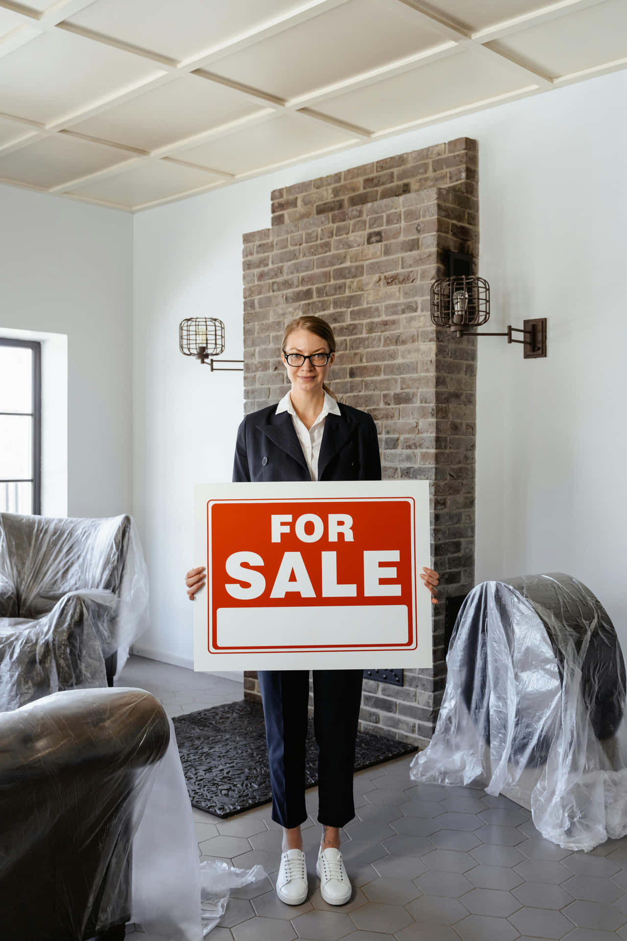 Real Estate Agent Holding For Sale Sign Background