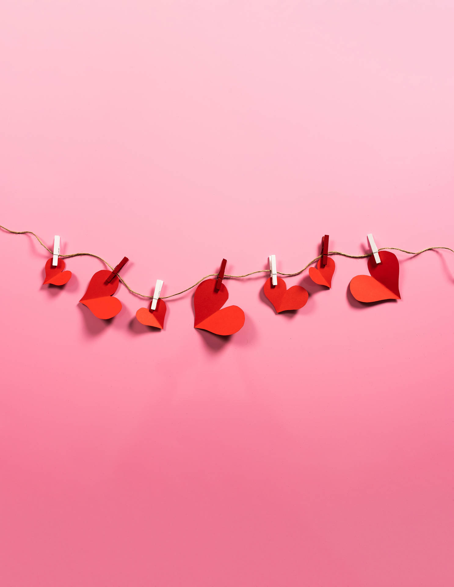 Really Cool Love Paper Hearts Hanging Background