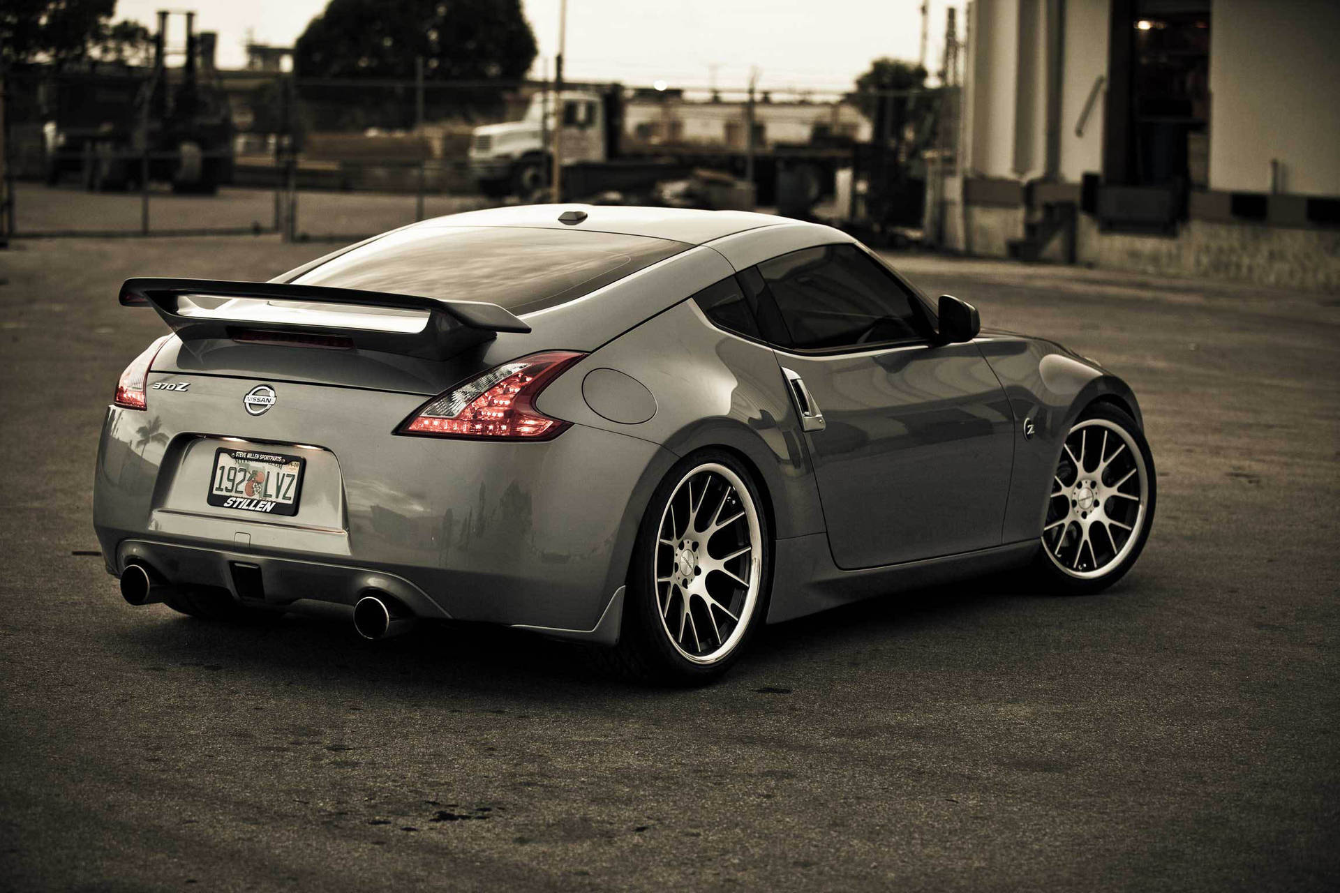 Rear View Of A Nissan 370z Background