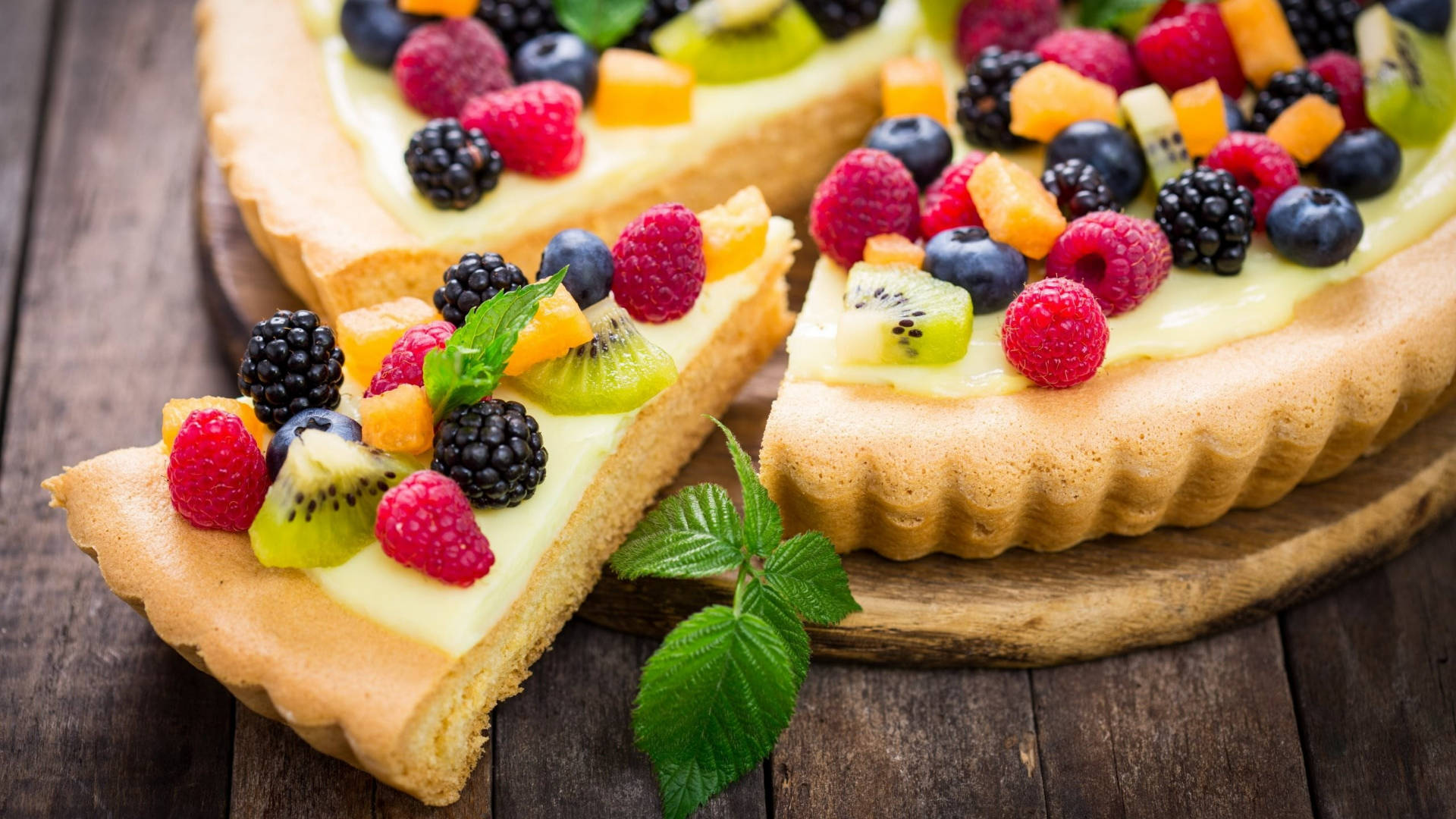 Red And Black Mulberry Fruits On A Cake