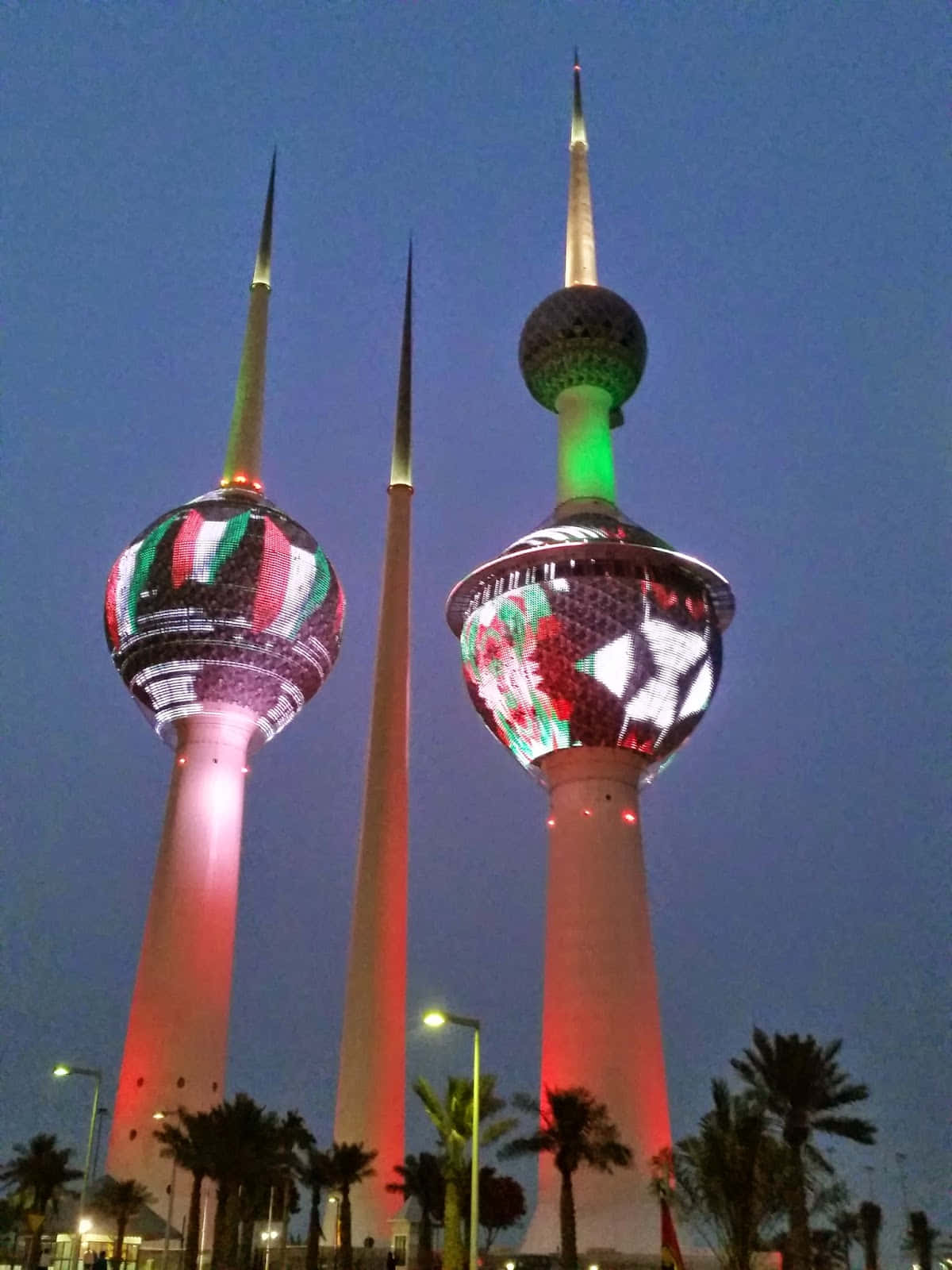 Red And Green Kuwait Towers Night Background