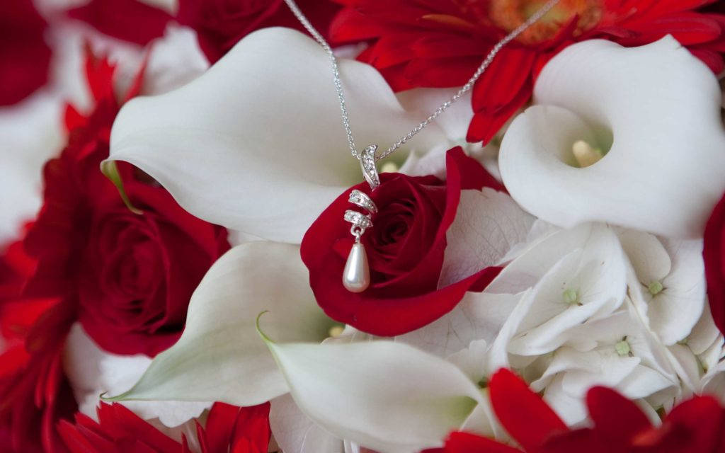 Red And White Flowers With Jewelry