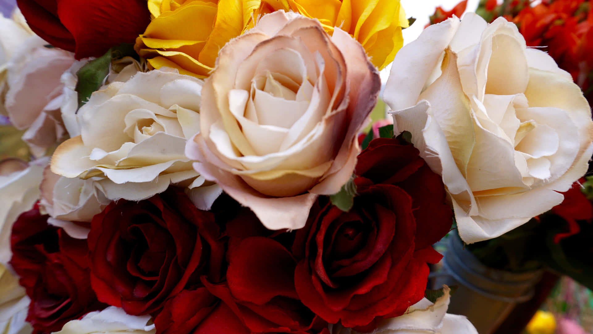 Red And White Roses In A Flower Arrangement Background