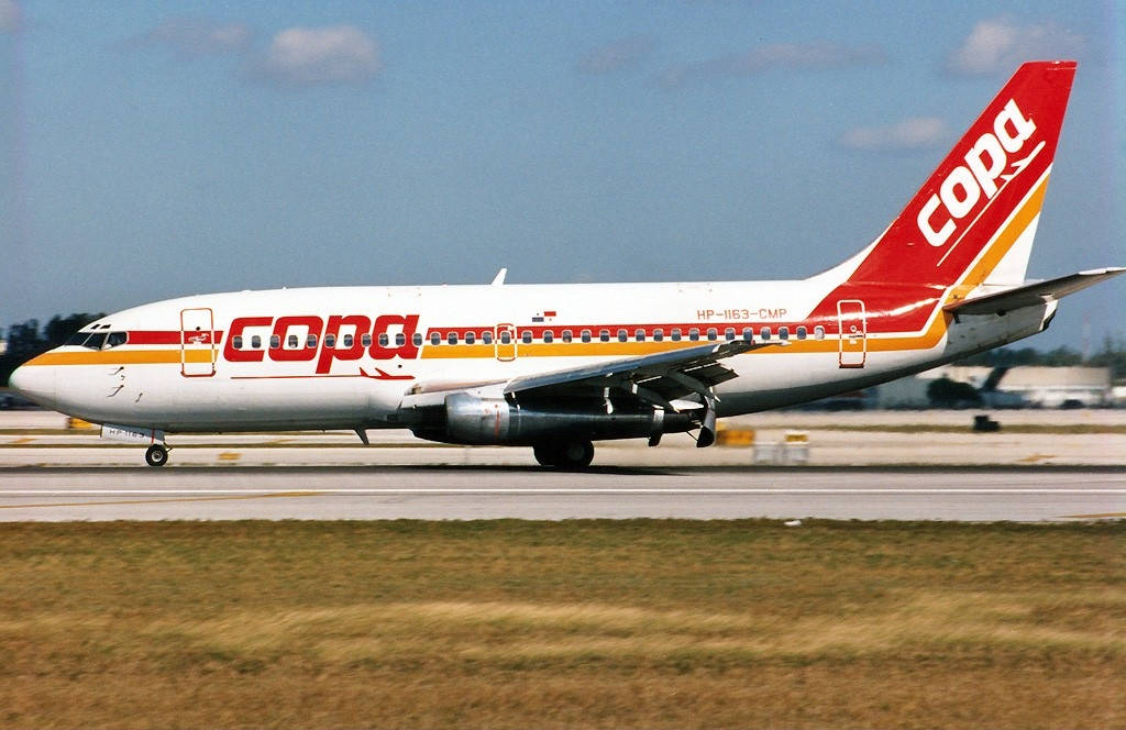 Red And Yellow Copa Airlines Plane Background