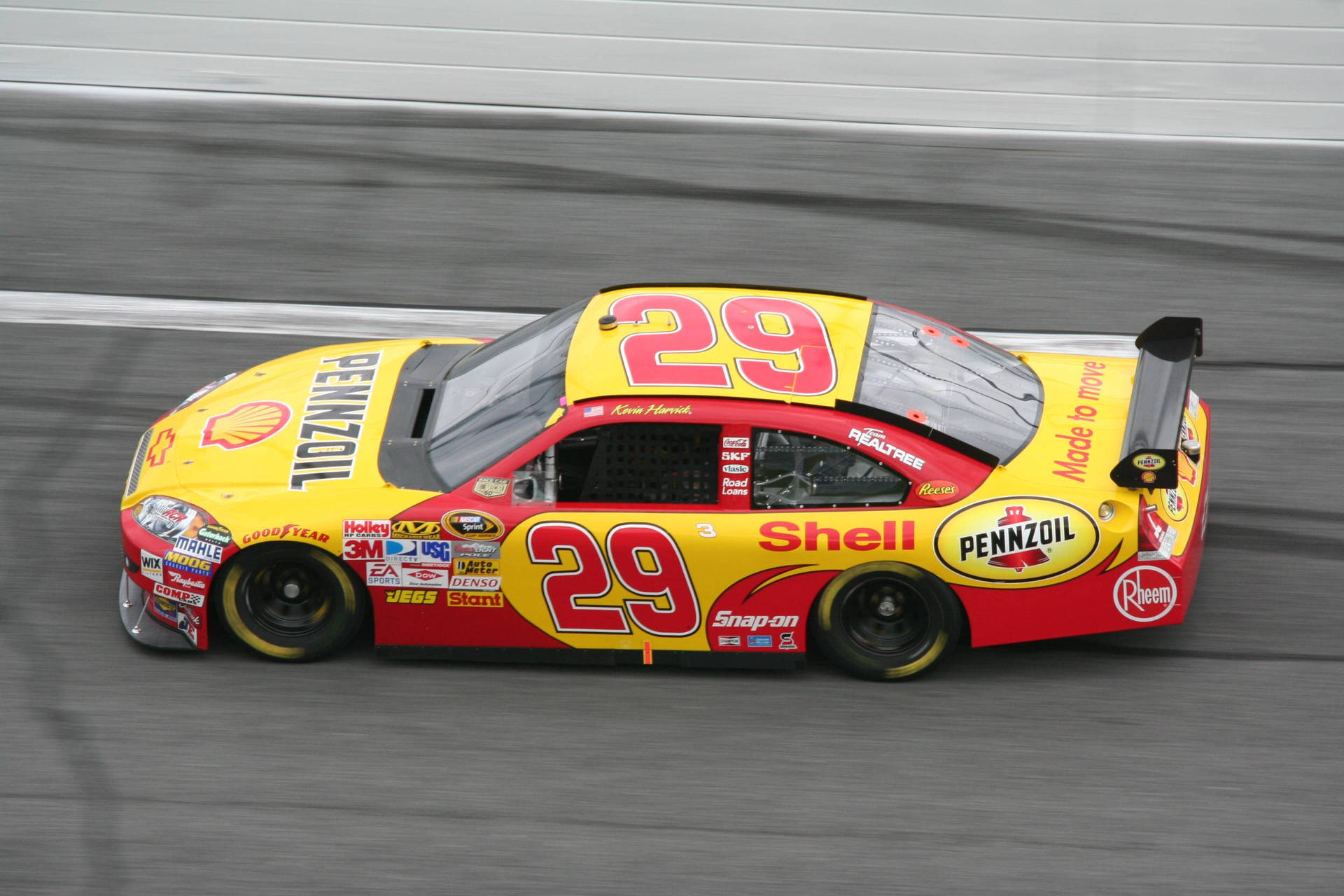 Red And Yellow Kevin Harvick Car Background