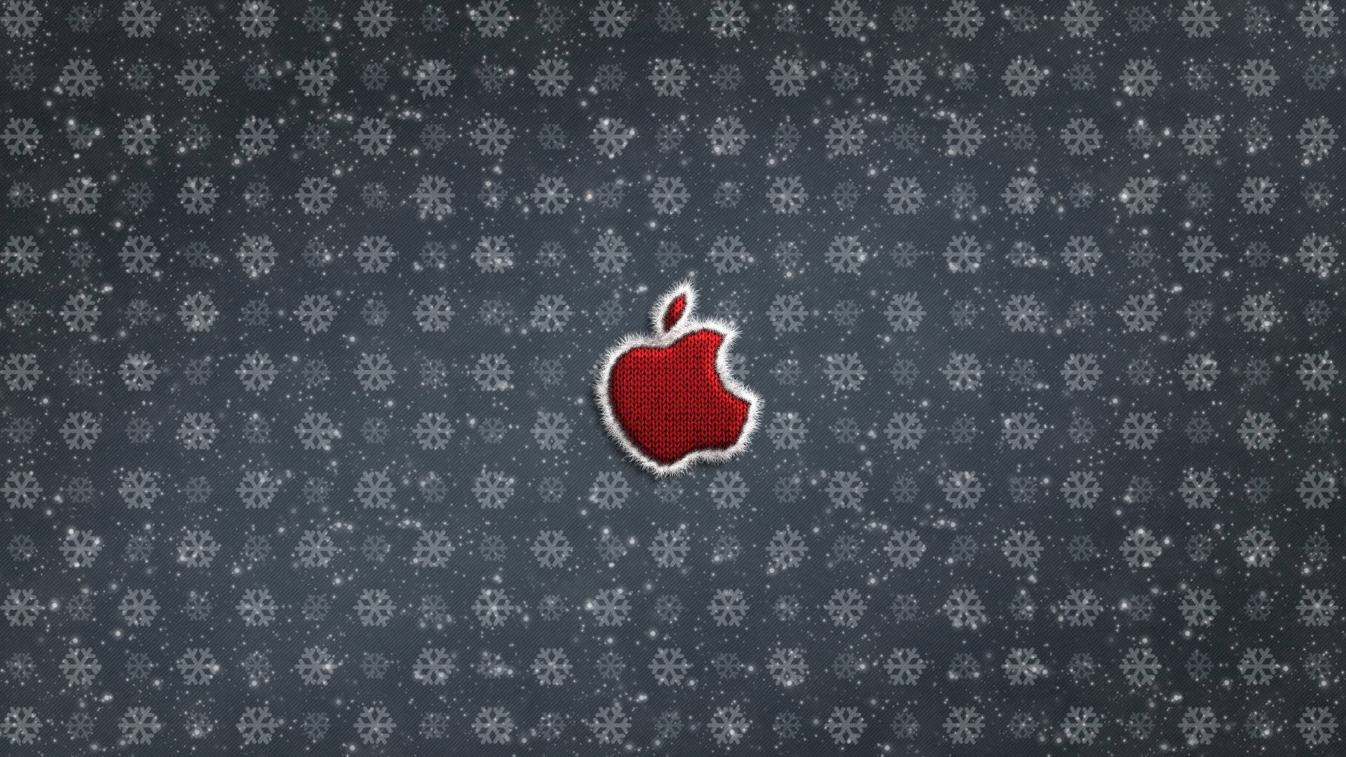 Red Apple Logo With Snowflakes Background