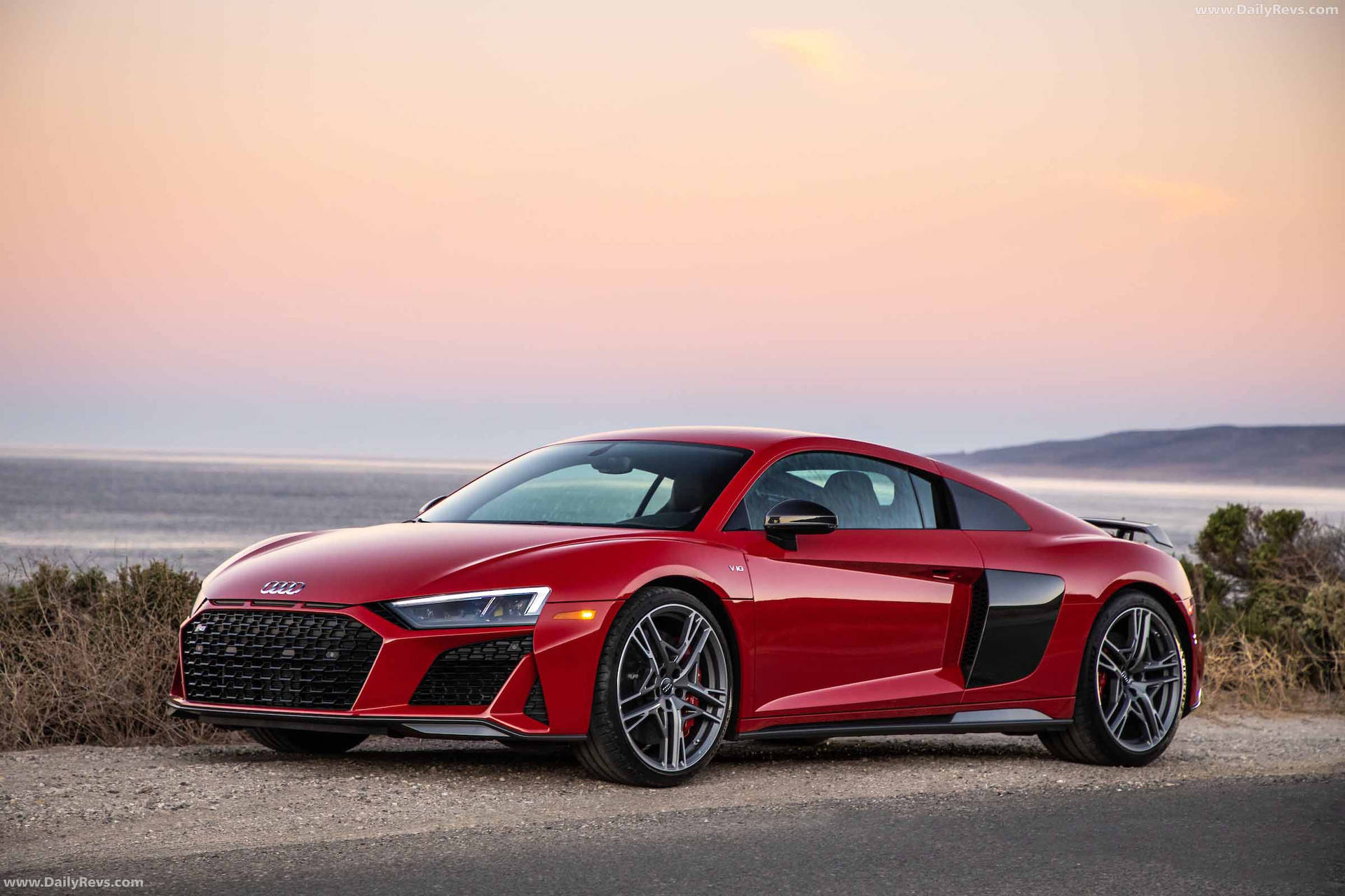 Red Audi R8 By The Sea Background
