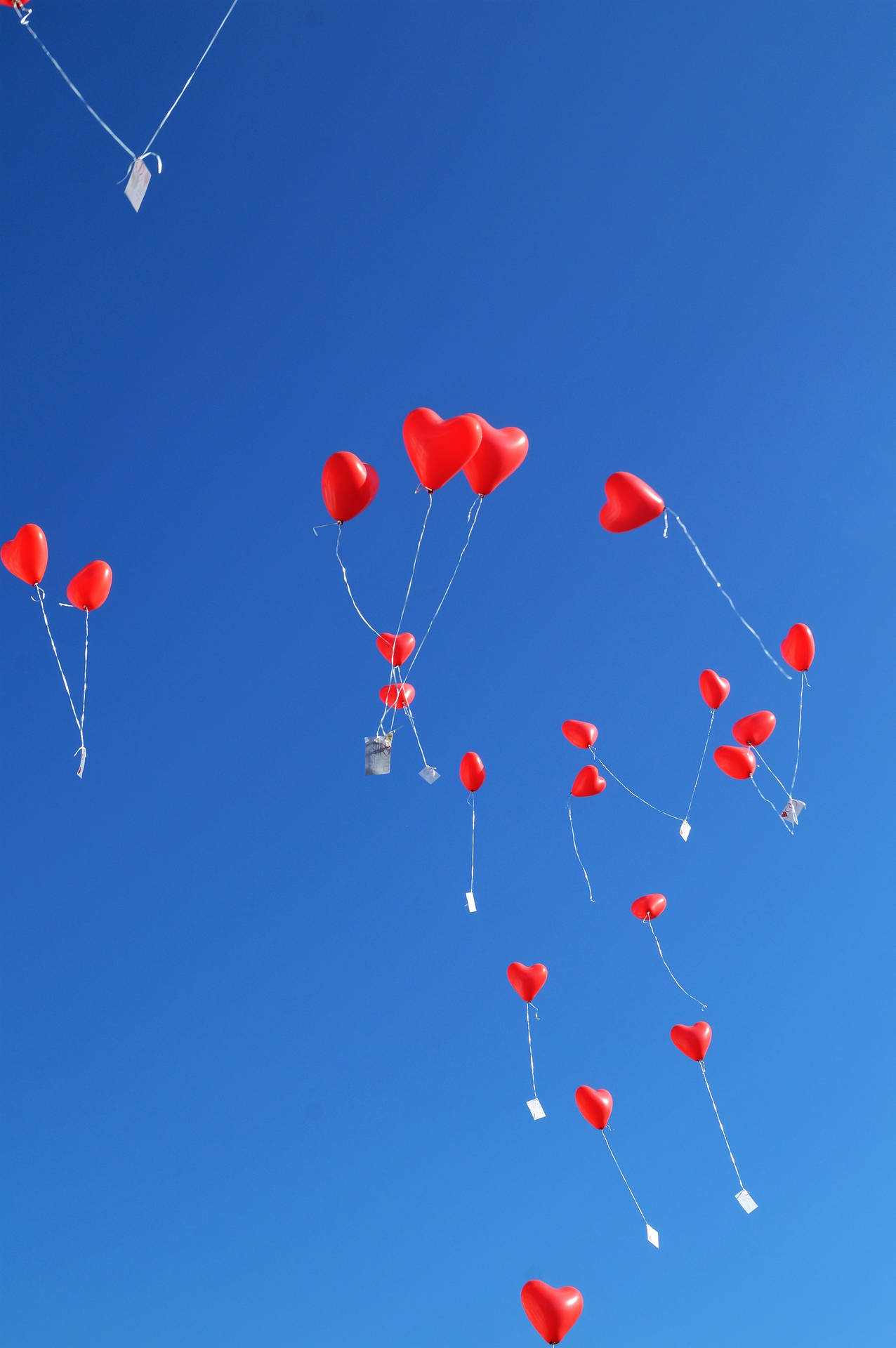 Red Balloons In Sky Background
