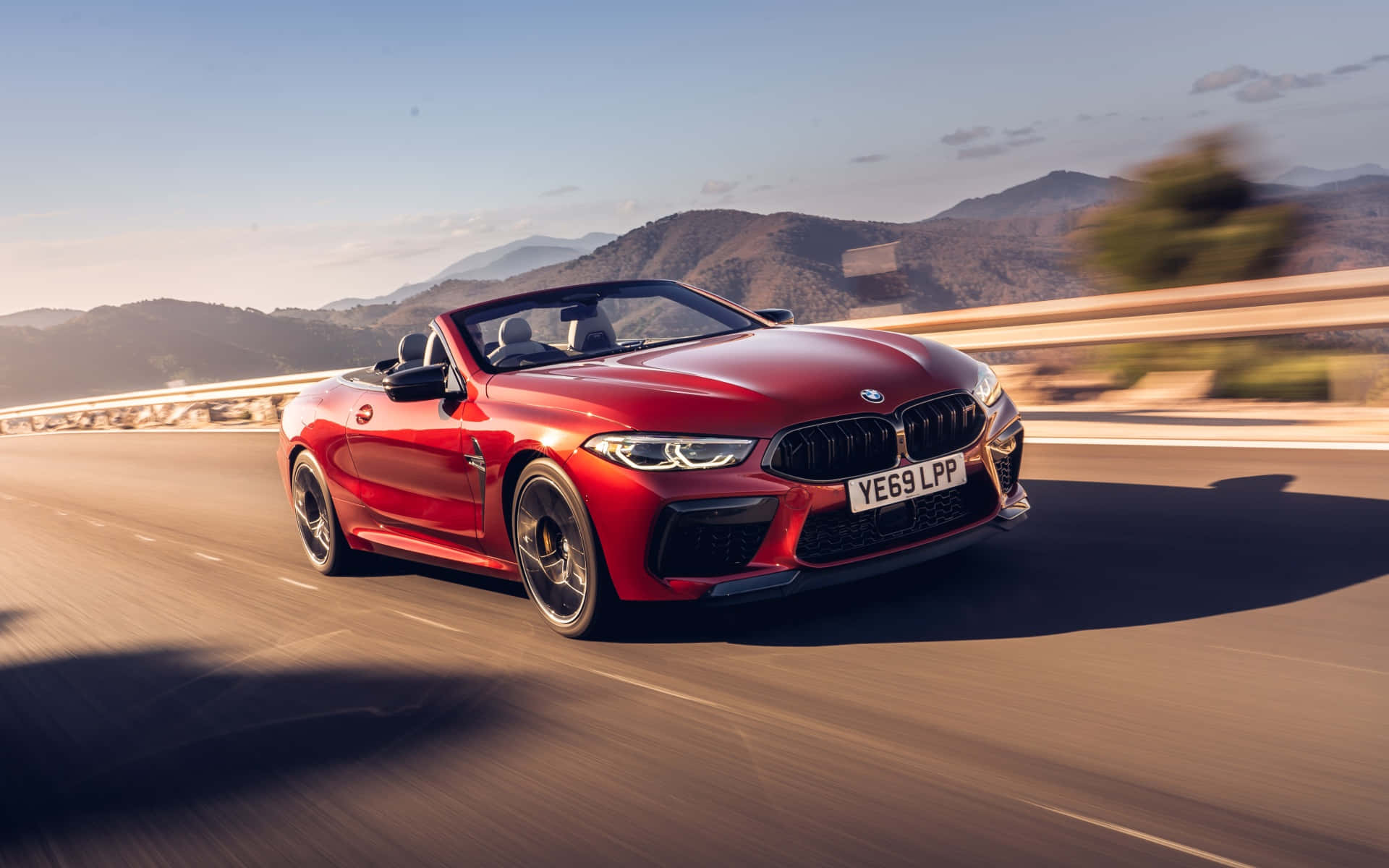 Red Bmw M8 On The Road 4k Background