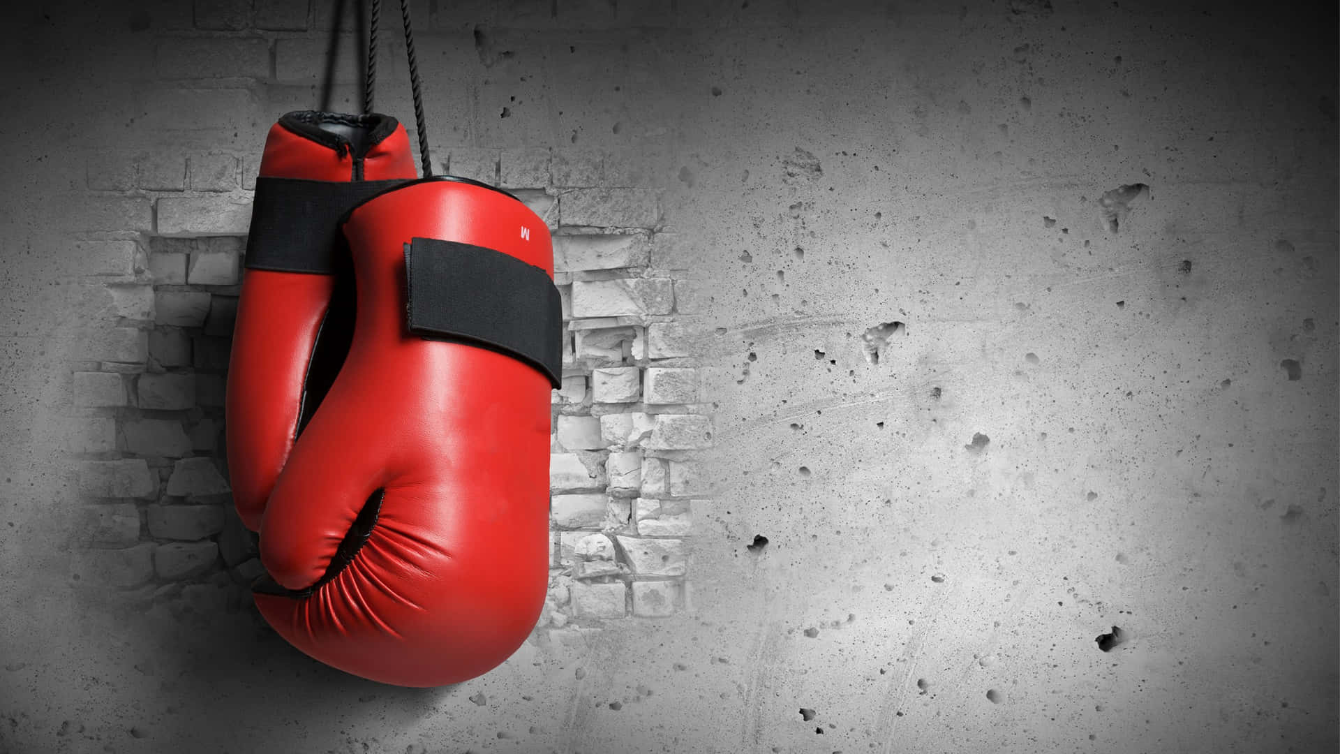 Red Boxing Gloves Hangingon Wall.jpg Background