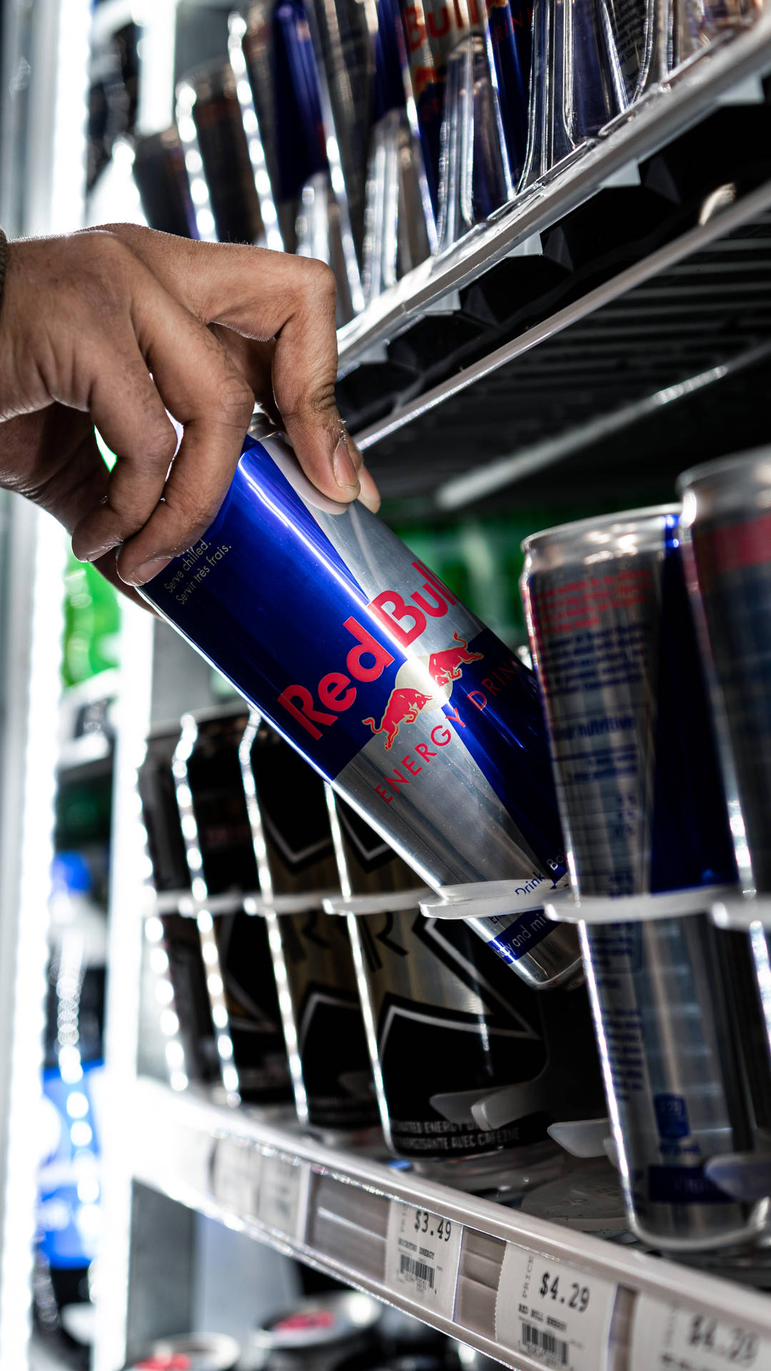 Red Bull Can At Grocery Macro Background