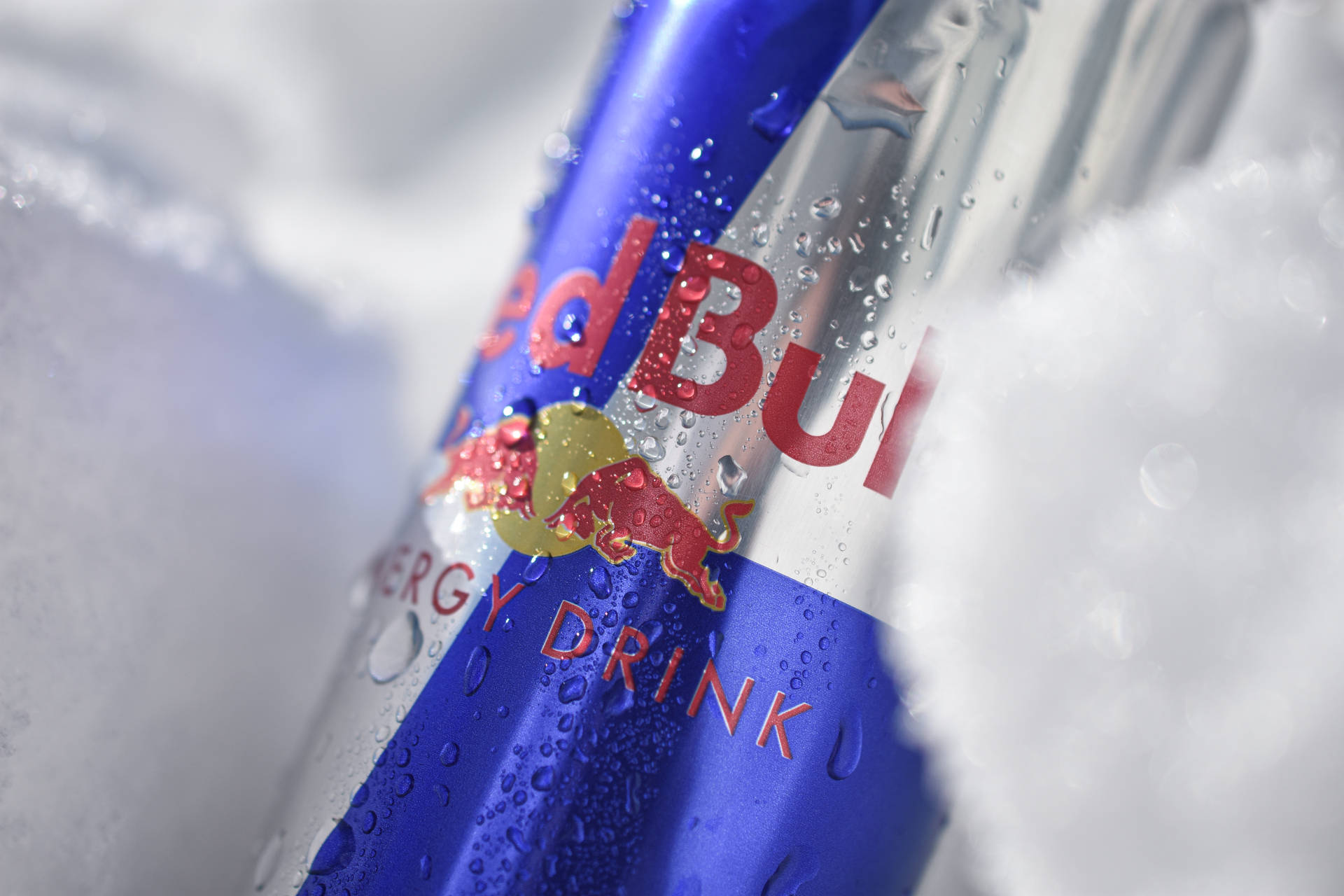 Red Bull Can Snow Macro Background