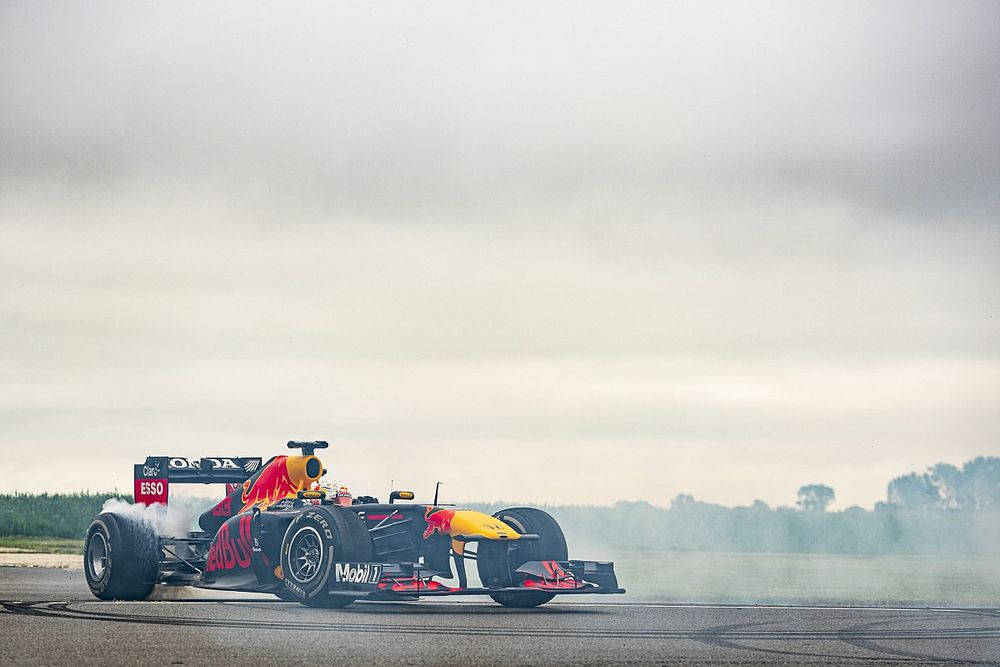 Red Bull Racing Doing Burnouts Background