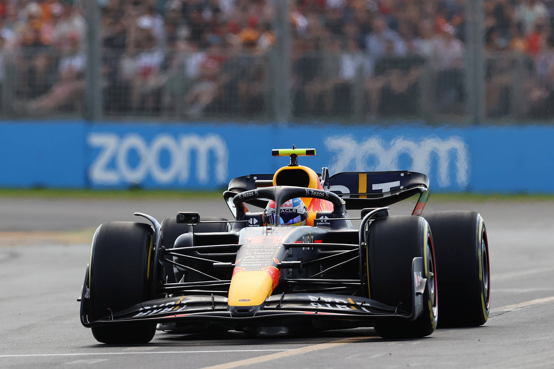 Red Bull Racing Dominates The Track Background