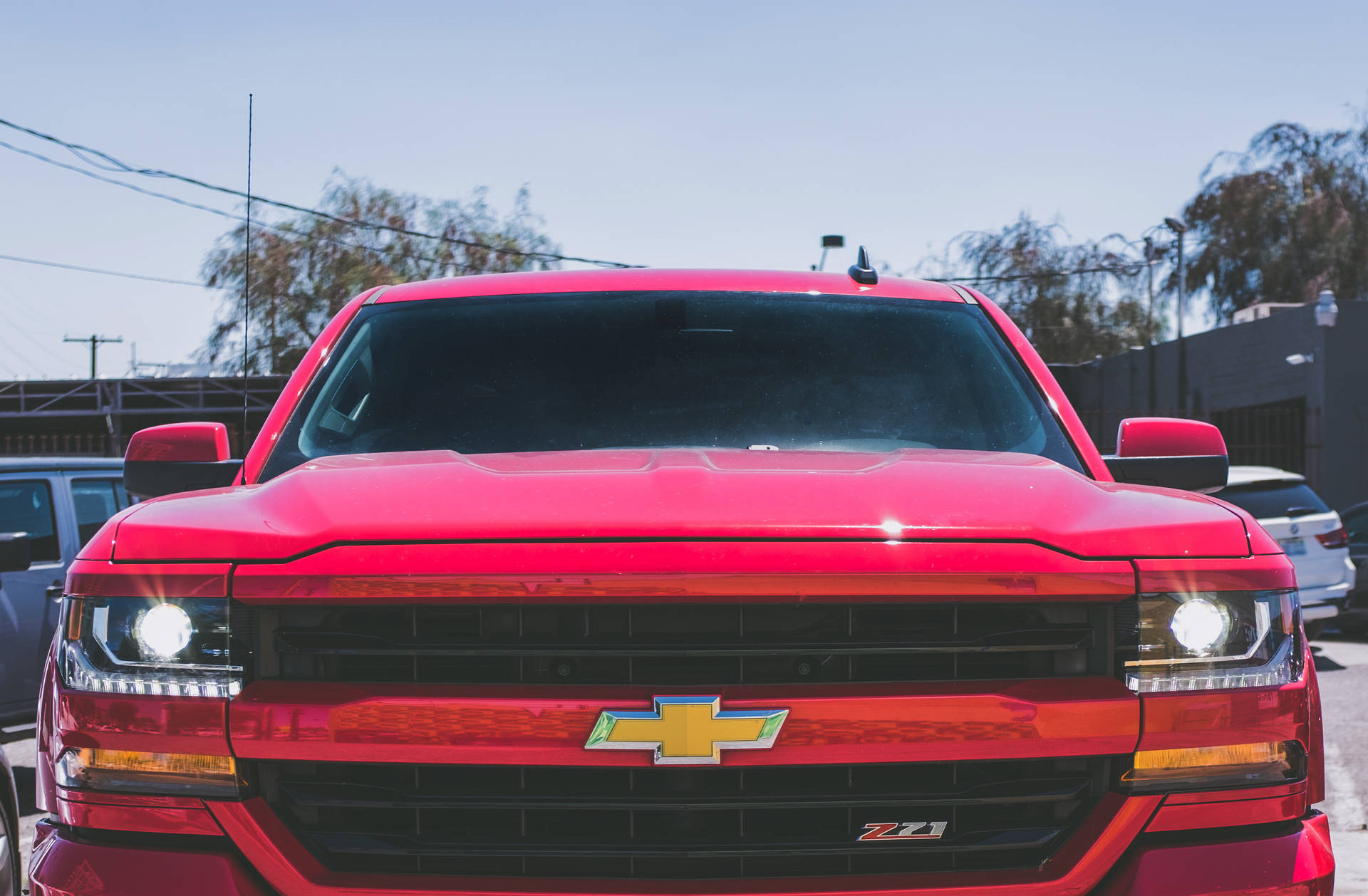 Red Chevrolet Silverado Front View Background