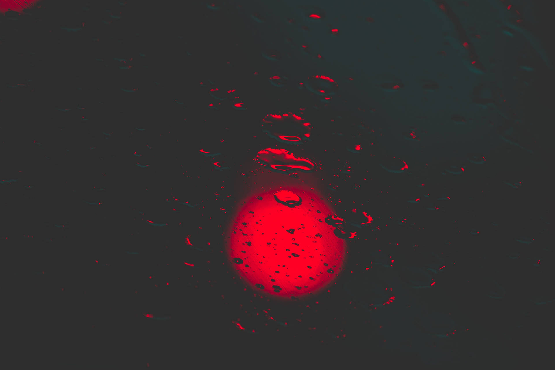 Red Circle With Water Droplets Background
