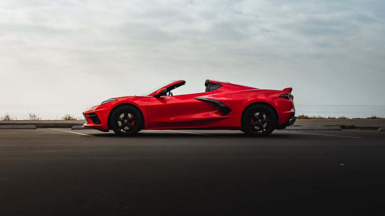 Red Corvette C8 Convertible Side View Background