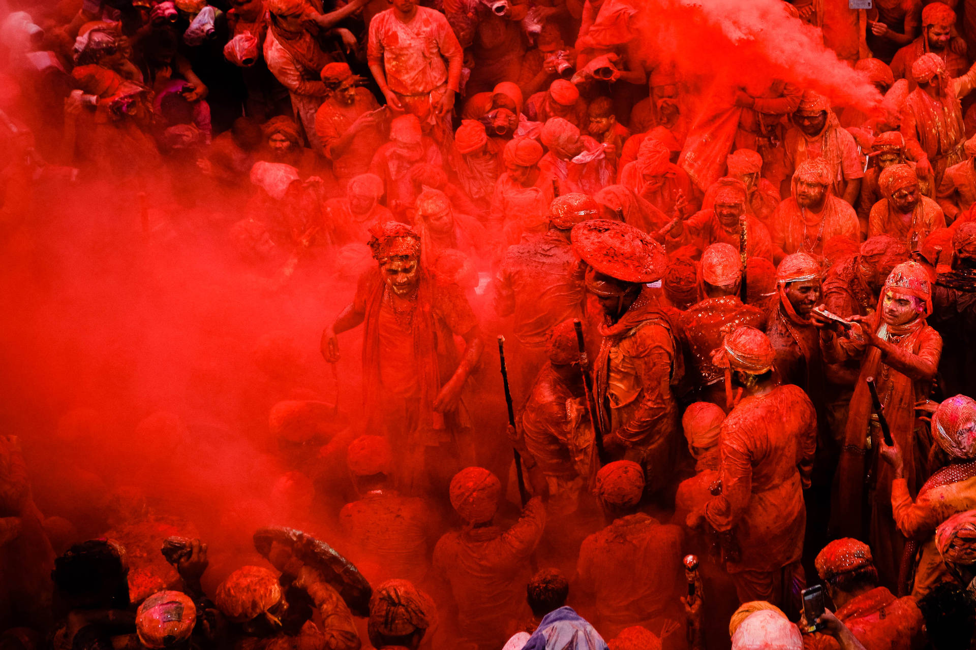 Red Covered India Holi Revelers Background