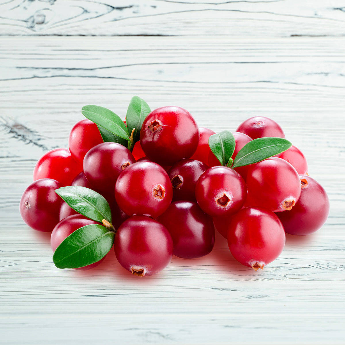 Red Cranberries On Wooden Table