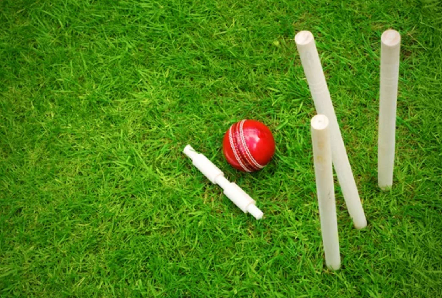 Red Cricket Ball Ground Background