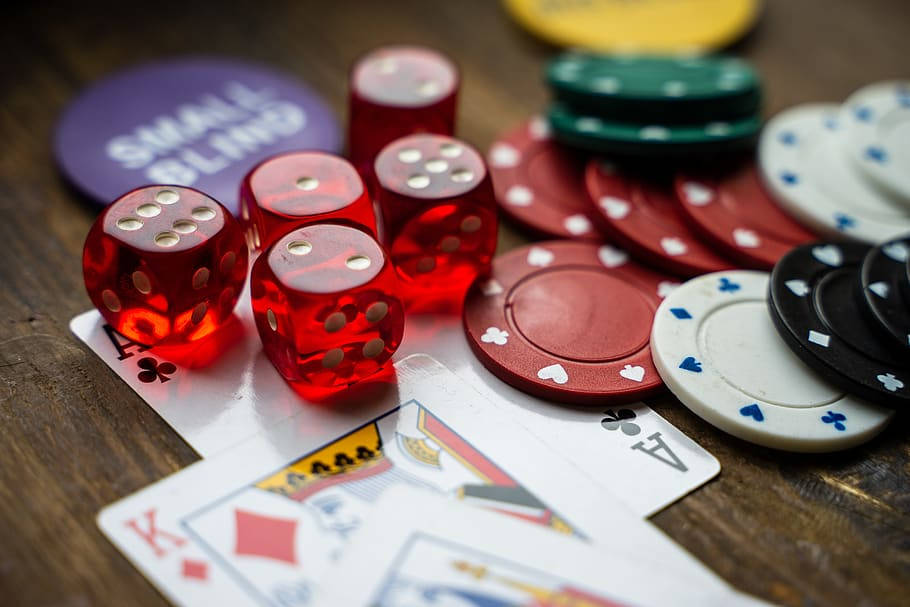 Red Dices Poker Chips And Cards Baccarat Wooden Table Background