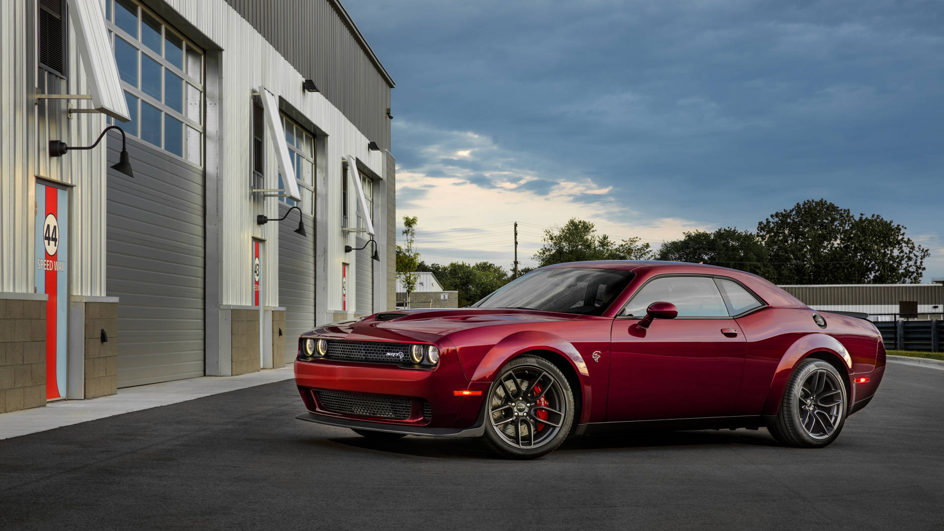 Red Dodge Challenger Demon 4k In Front Of A Building