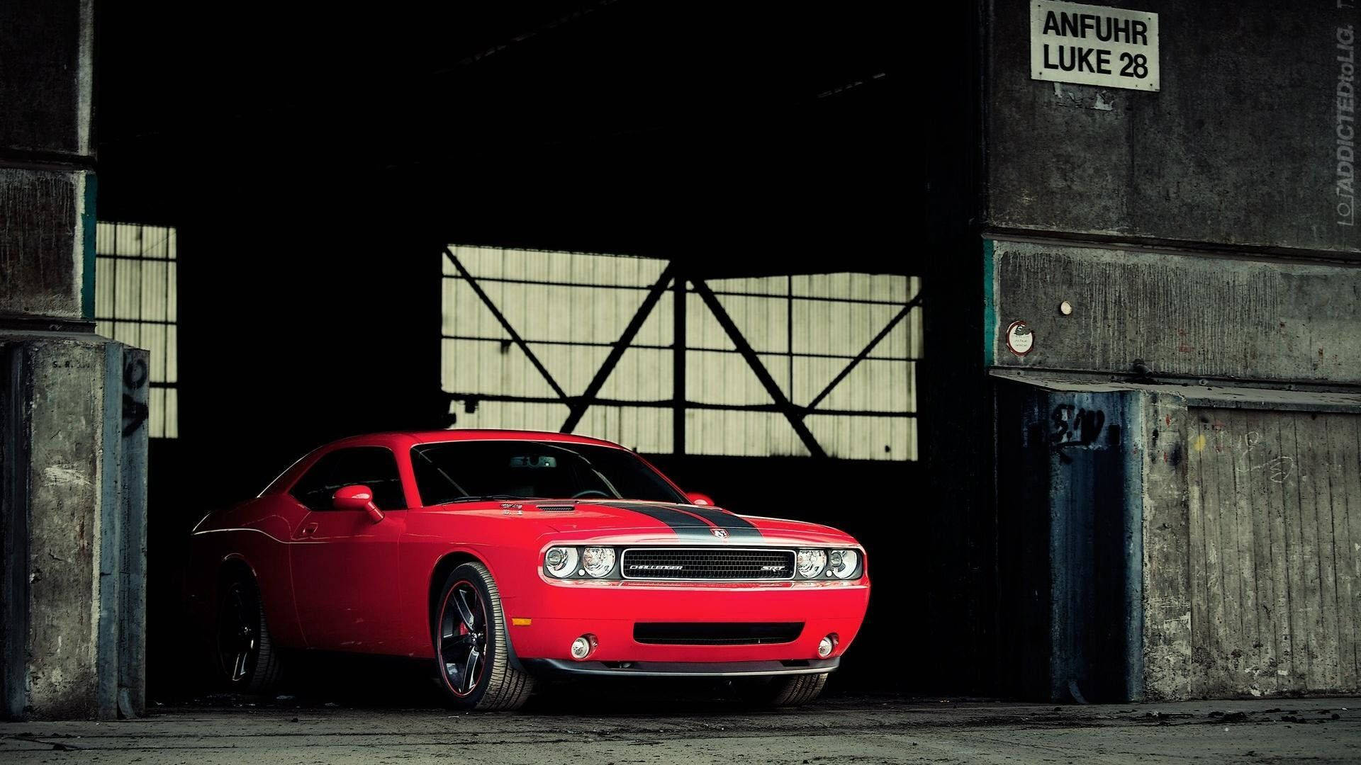 Red Dodge Challenger In Garage Background