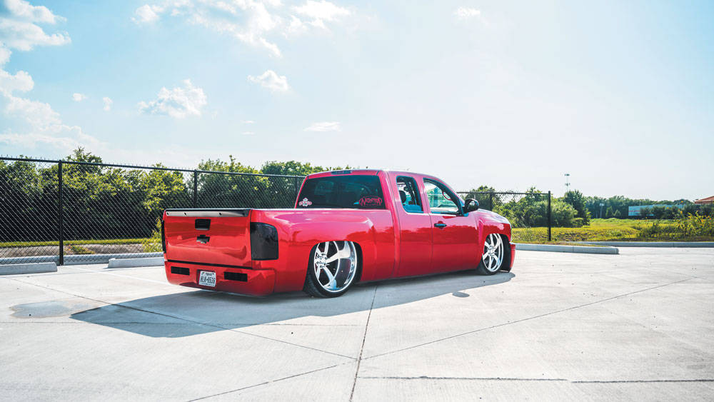 Red Dropped Truck On Concrete Background