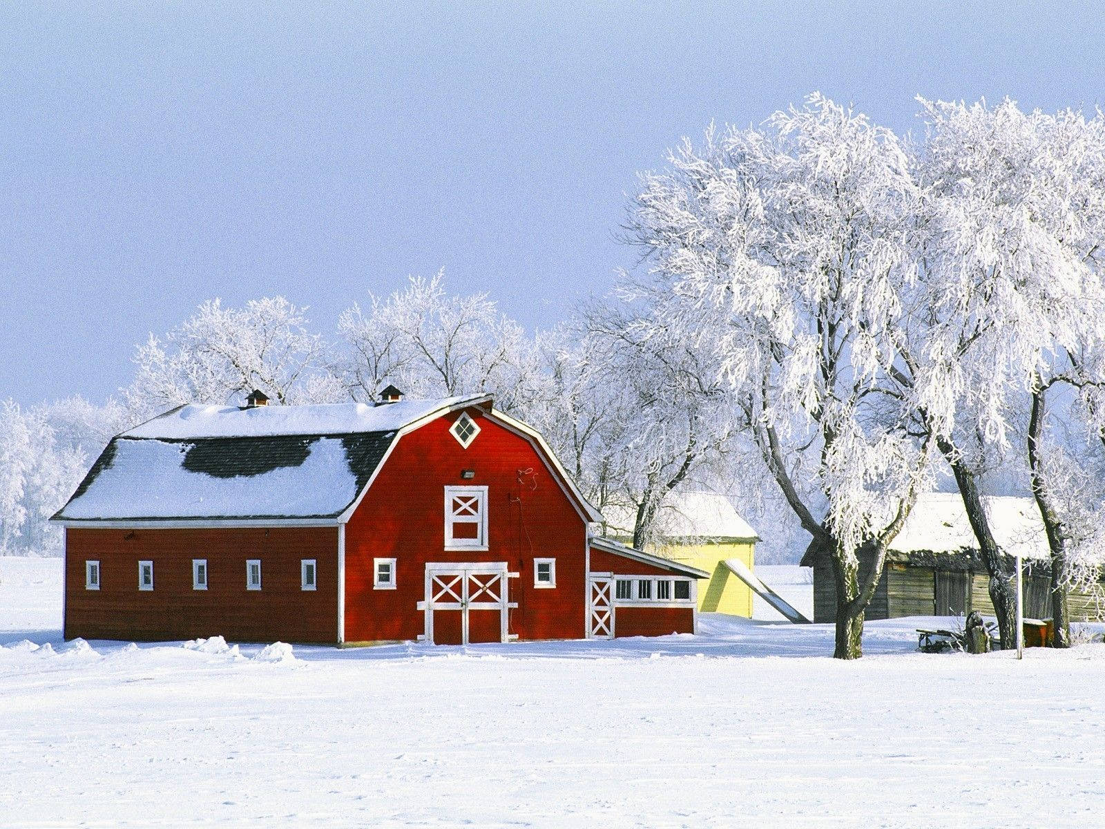 Red Farmhouse In Winter Background