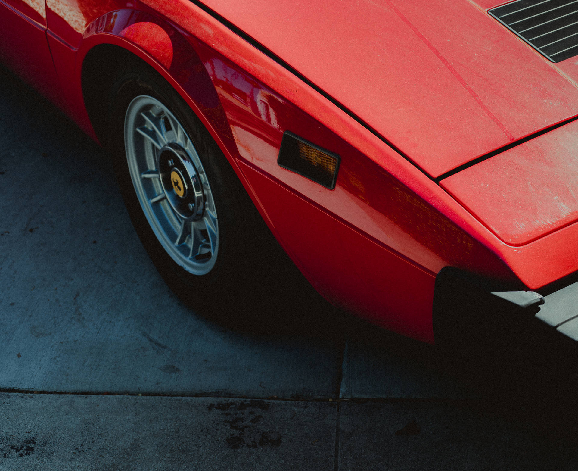 Red Ferrari Rear Wheel Background