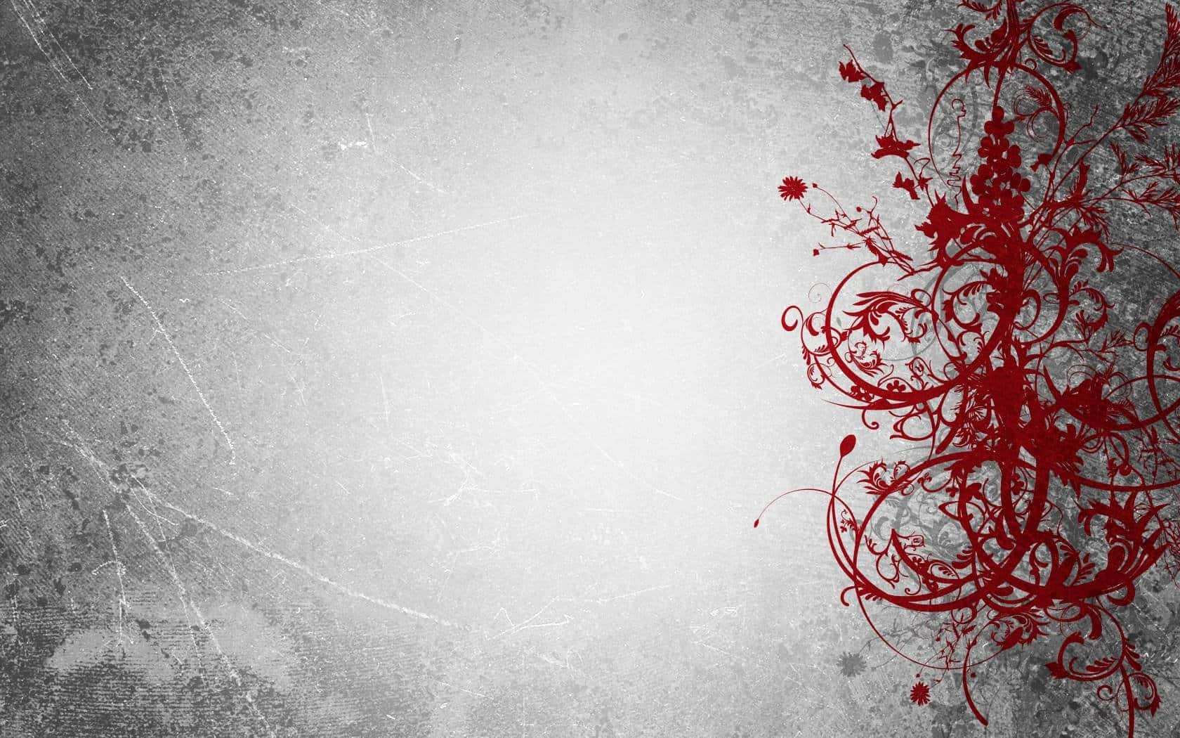 Red Flourish On Grunge Grey Desktop Background