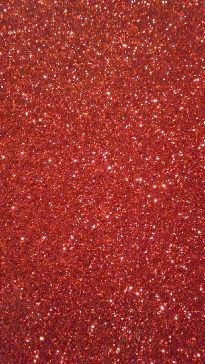 Red Glitter Background With A Close Up View
