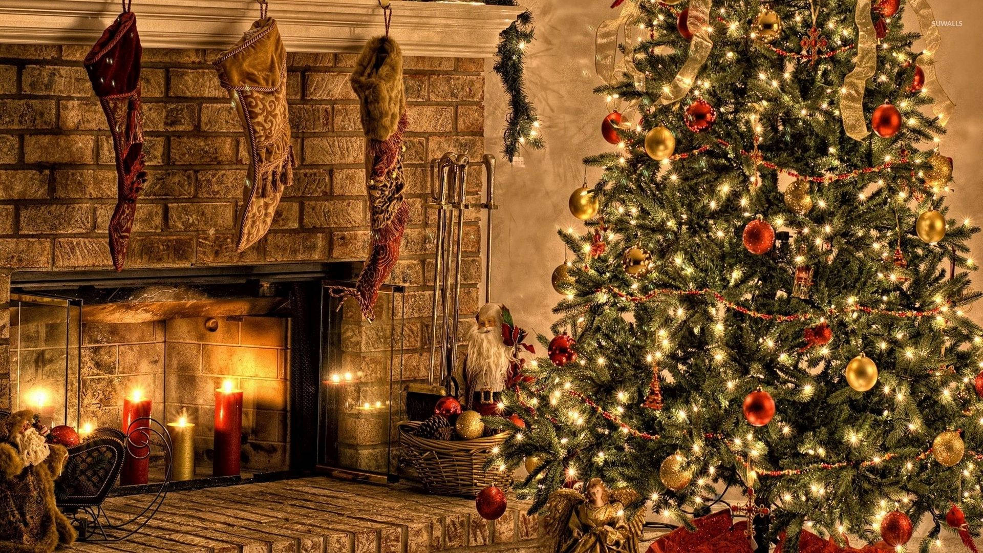 Red Gold Christmas Tree By The Fireplace Background