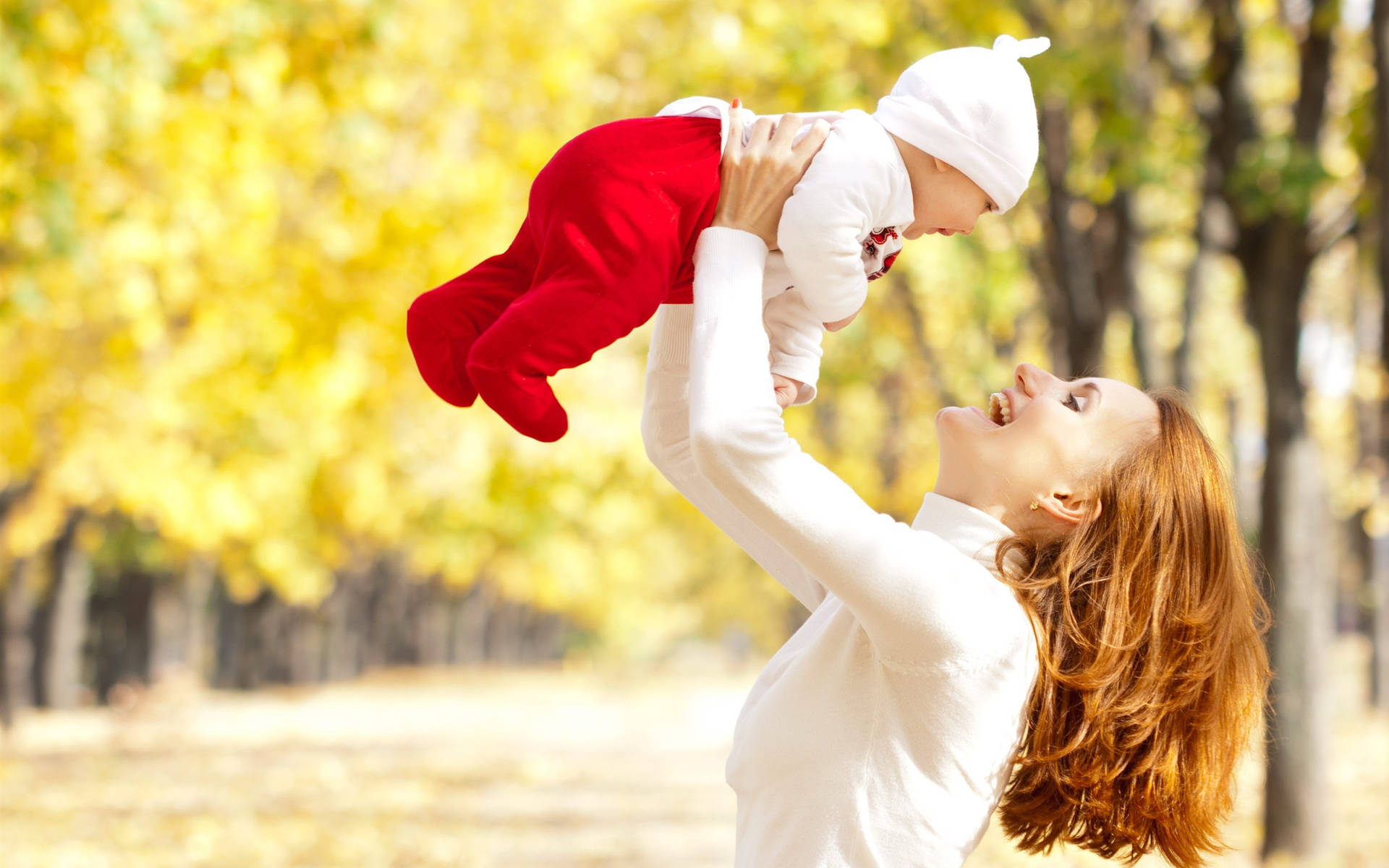 Red Haired Mother And Baby Background