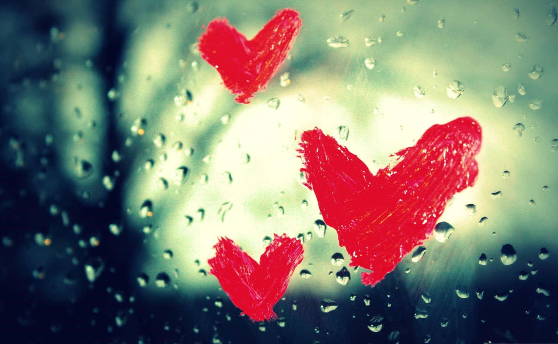 Red Hearts On A Rainy Window Background