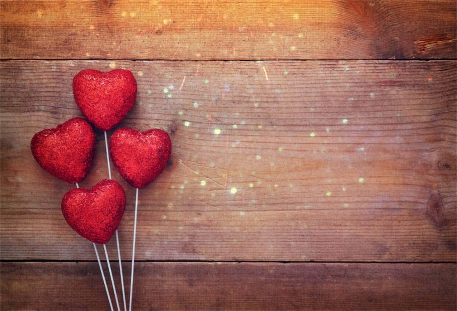 Red Hearts On A Wooden Background