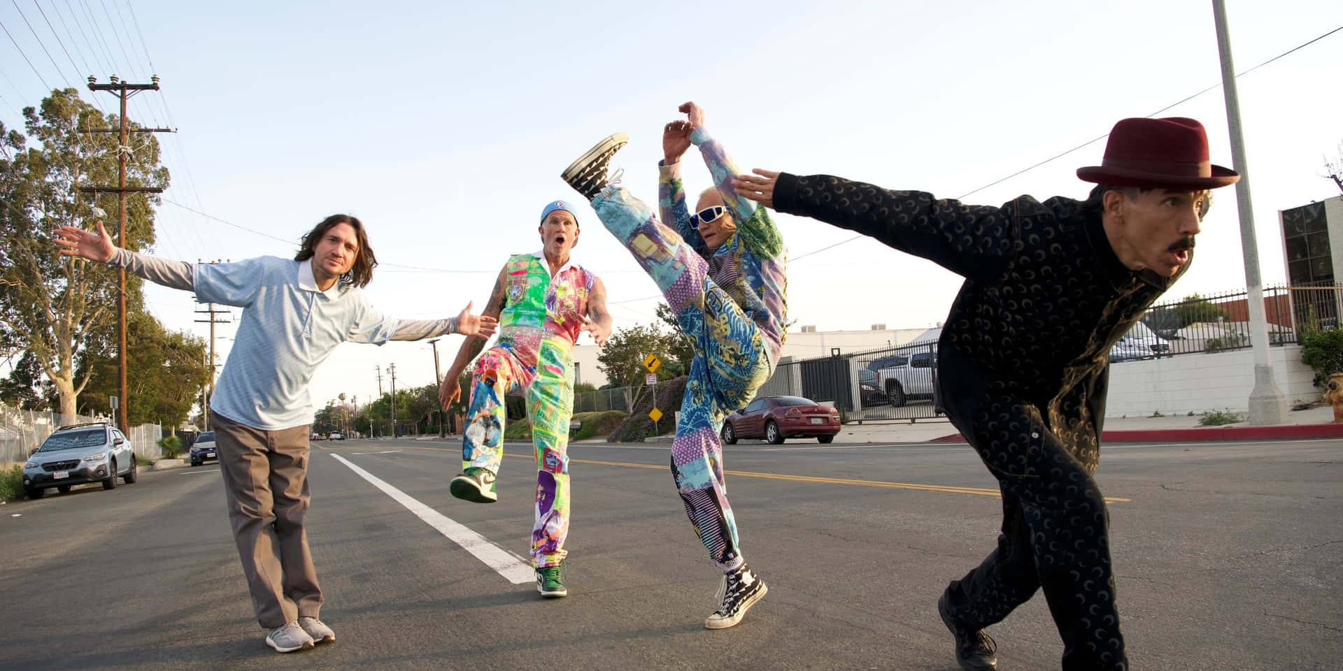 Red Hot Chili Peppers In Colorful Onesies