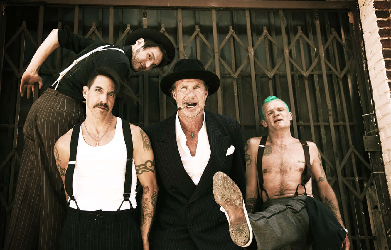 Red Hot Chili Peppers In Suspenders Background