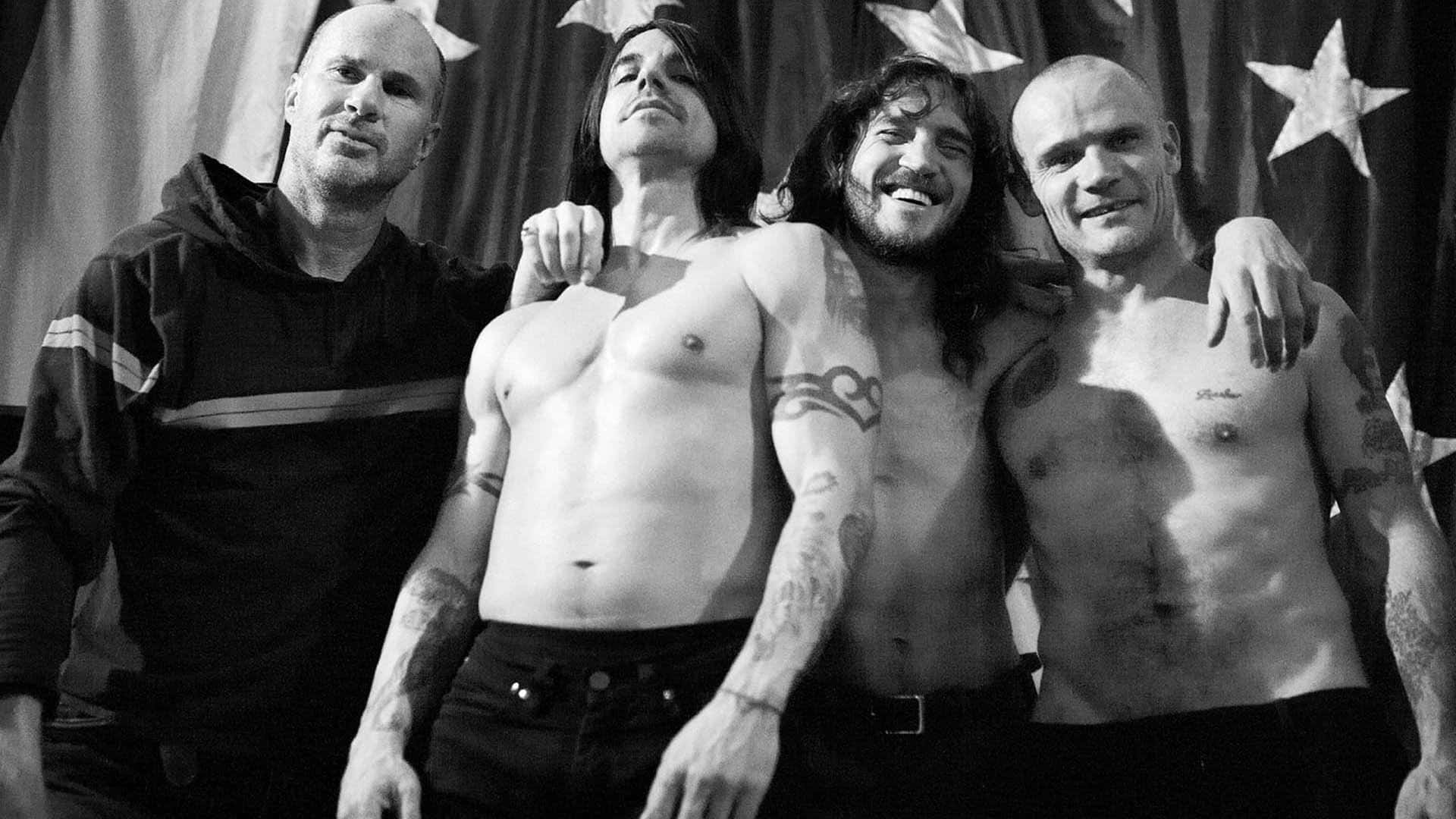 Red Hot Chili Peppers Members Posing Shirtless Background