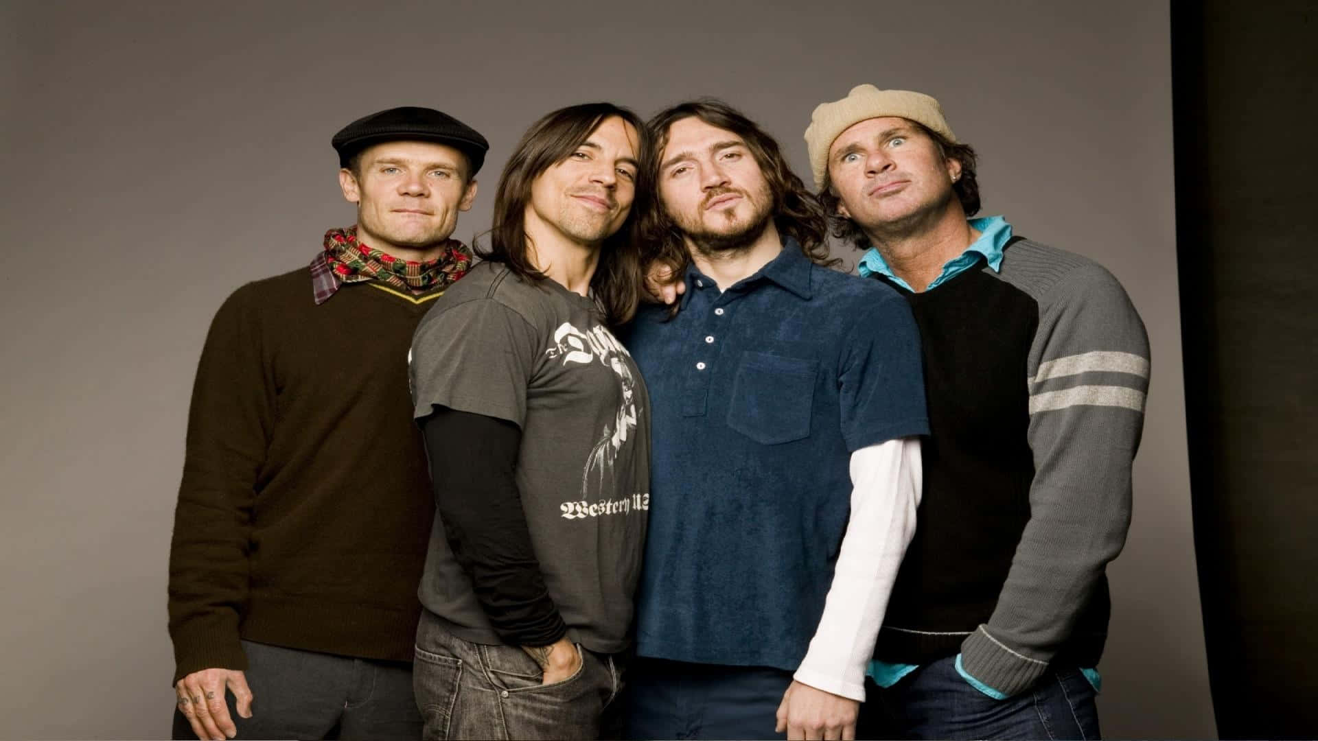 Red Hot Chili Peppers Posing Together Background