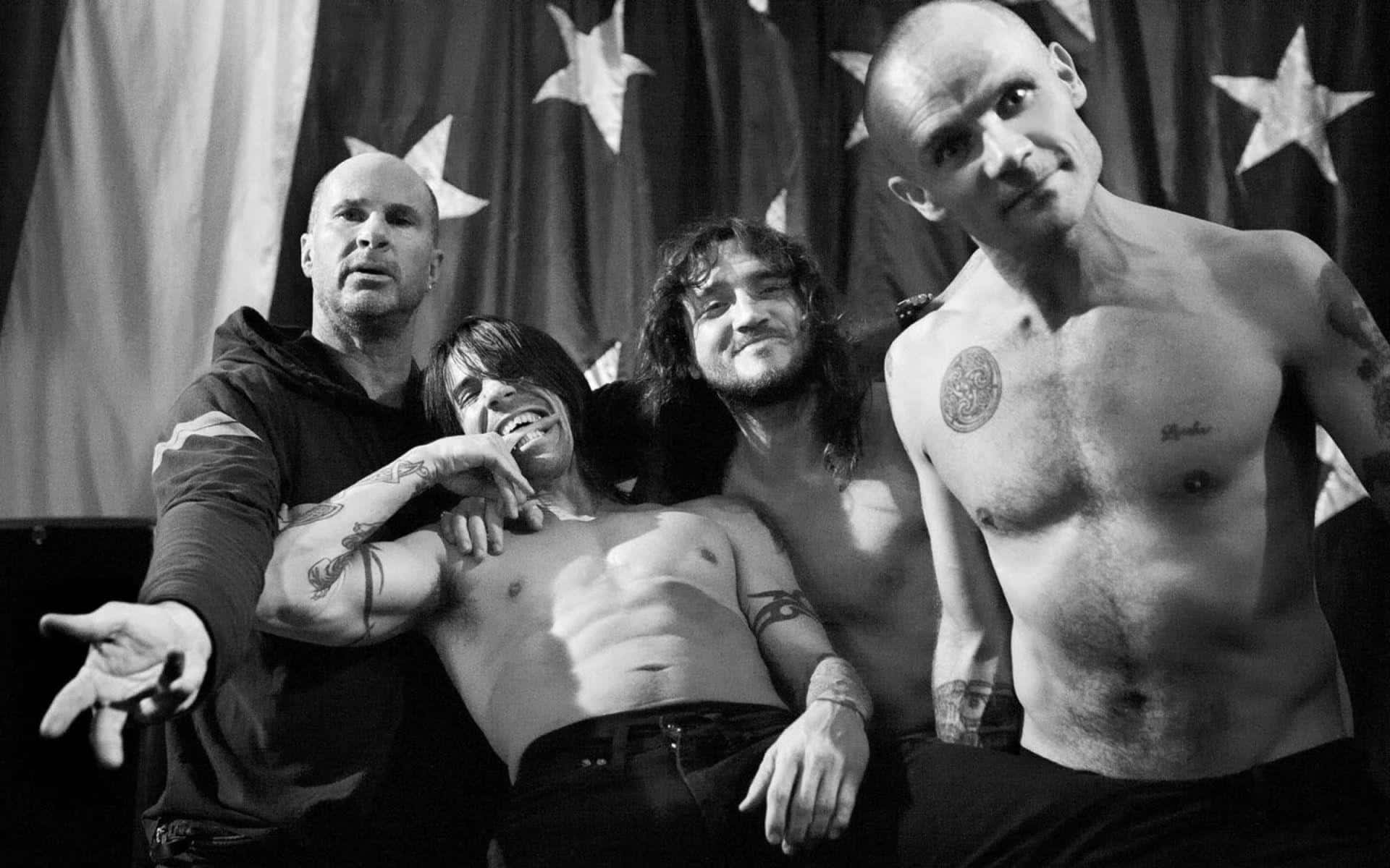 Red Hot Chili Peppers With A Flag Background