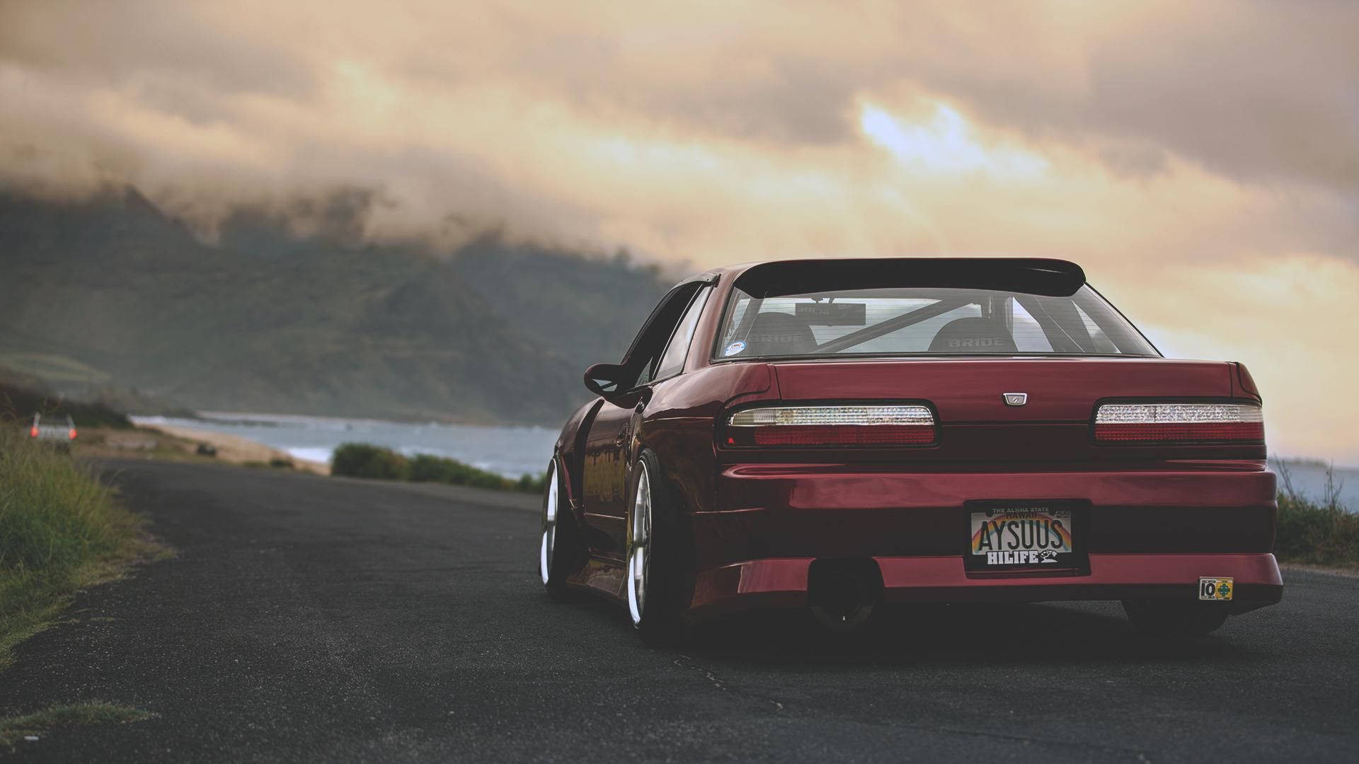 Red Jdm Nissan Silvia S14 Ocean Road Background