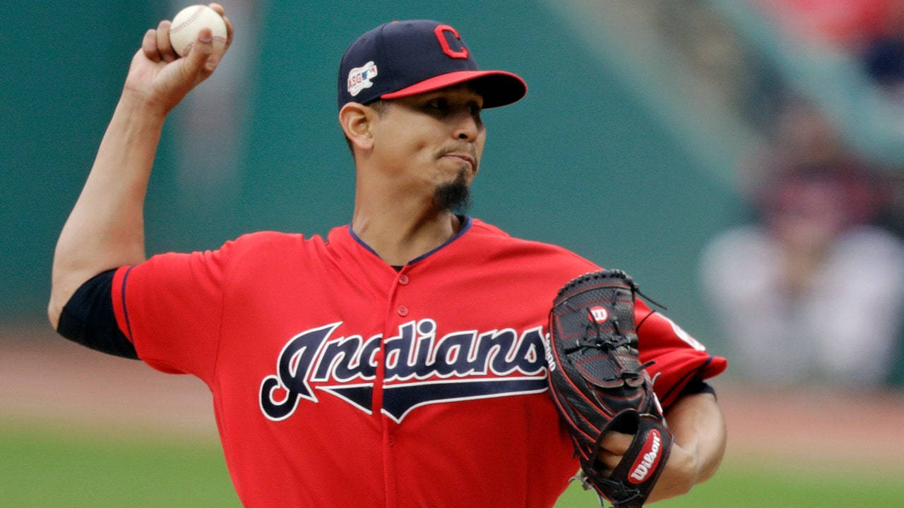 Red Jersey Carlos Carrasco Throwing Ball Background