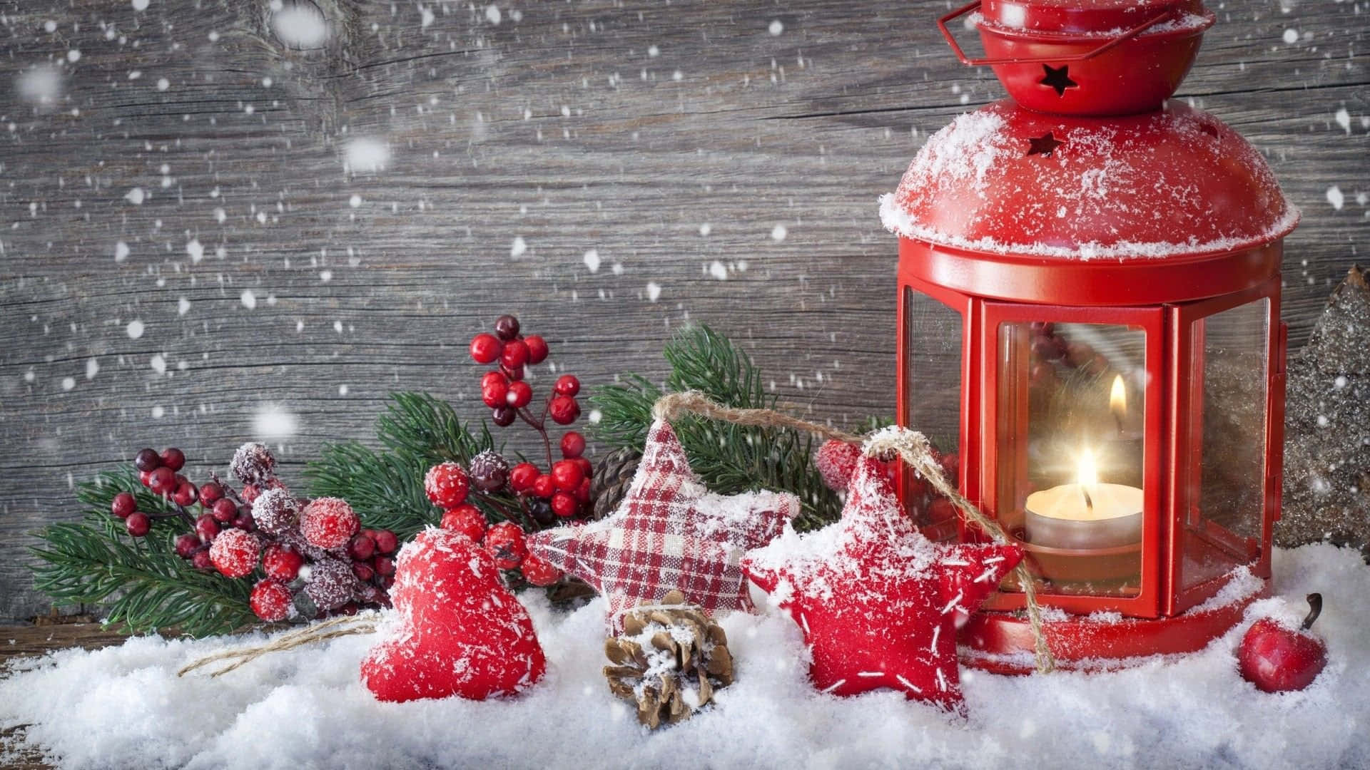 Red Lantern With Snow And Decorations On A Wooden Table Background