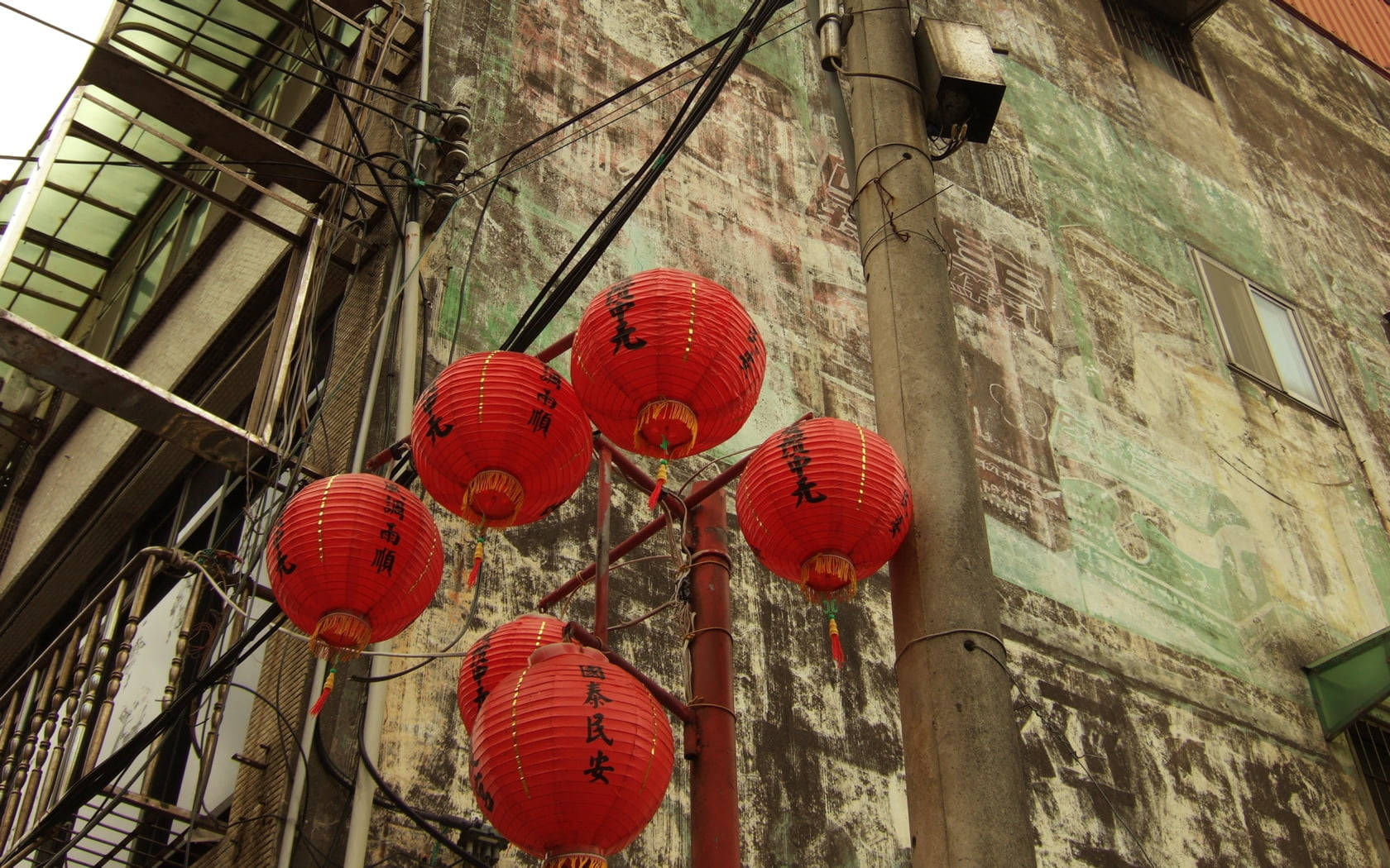 Red Lanterns Near Chinese House Background