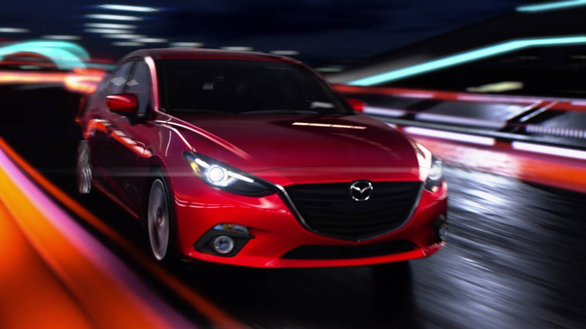 Red Mazda 3 In Motion Background