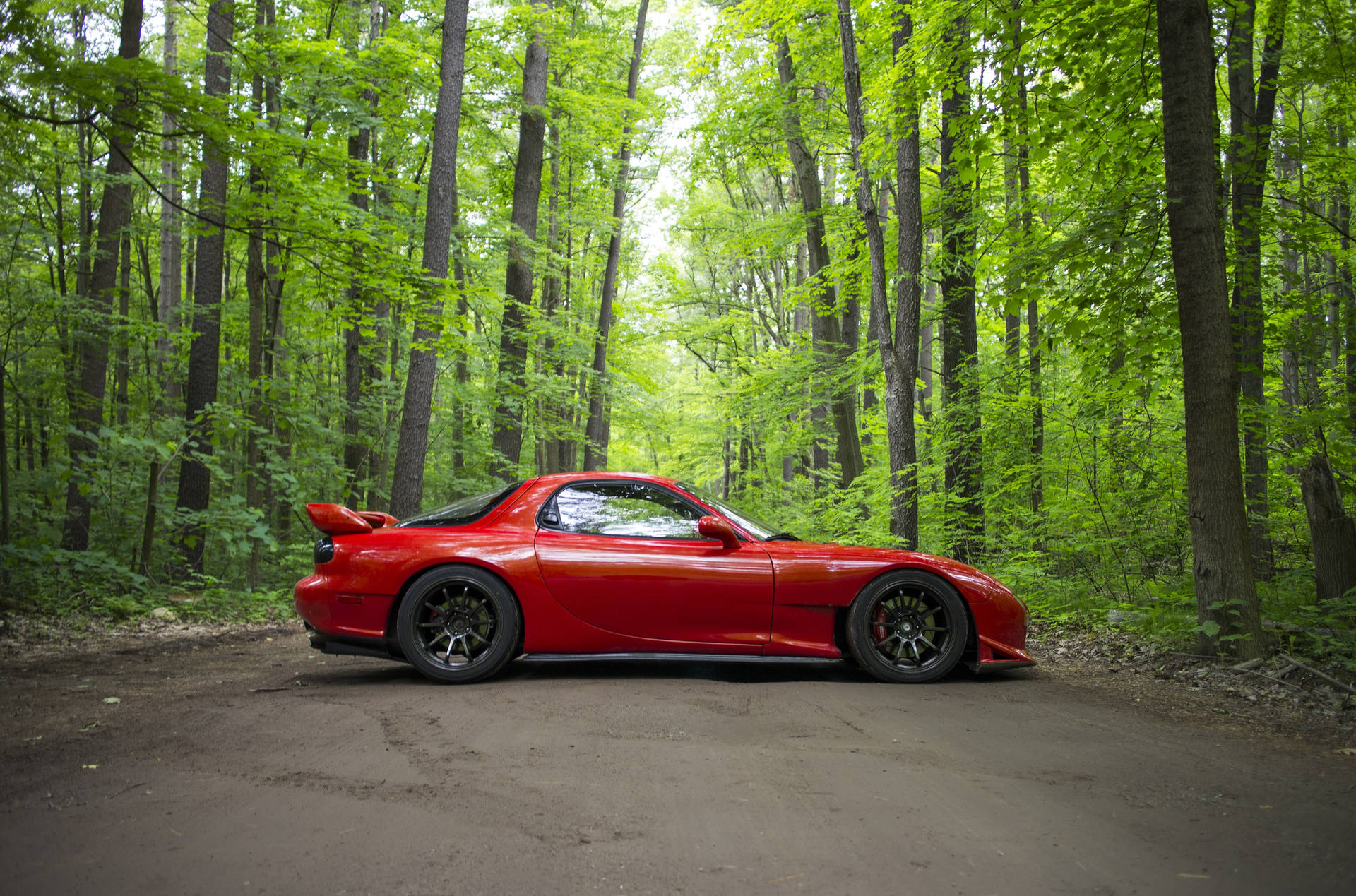 Red Mazda Rx7 And Trees Background