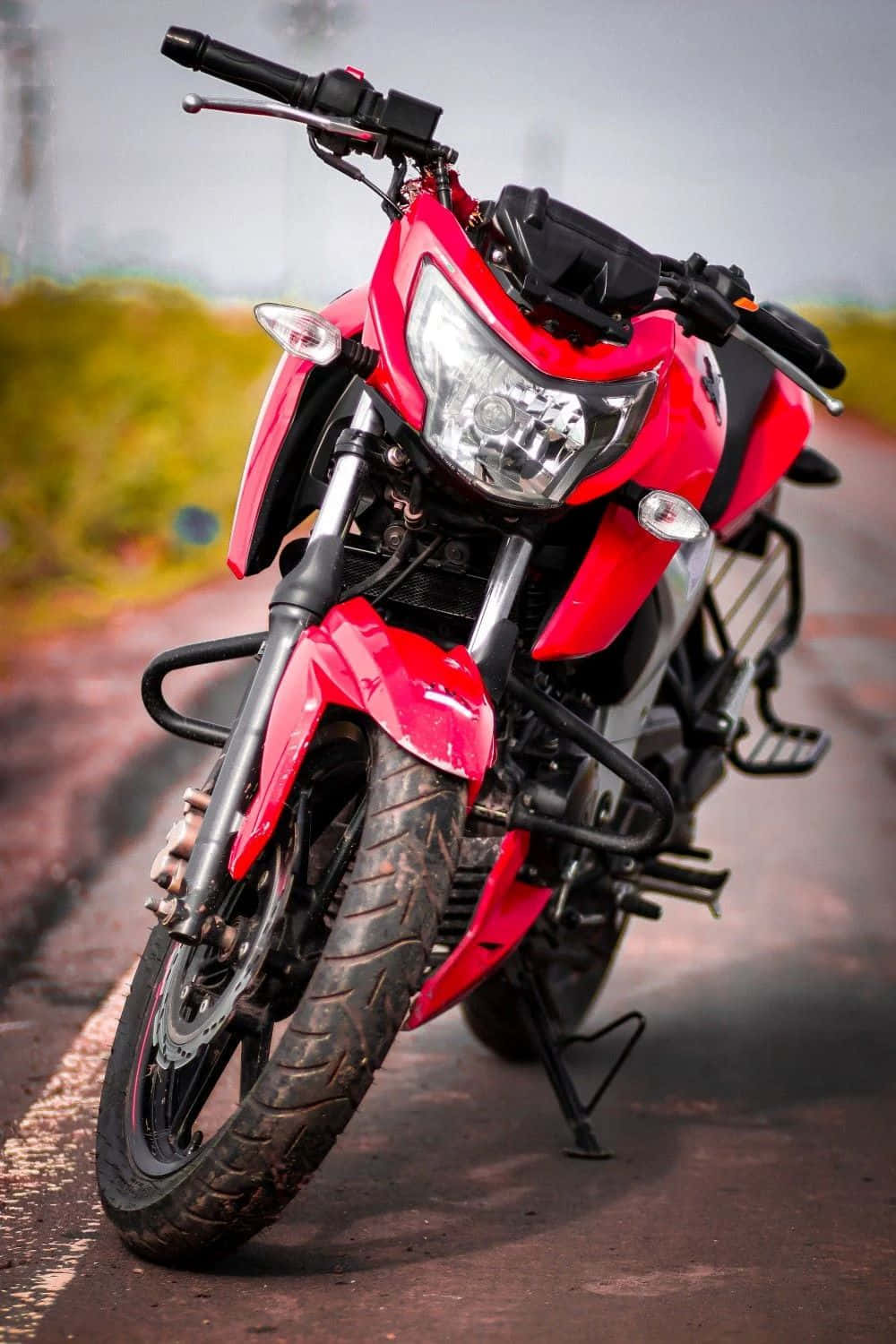 Red Motorcycle Parked Outdoors