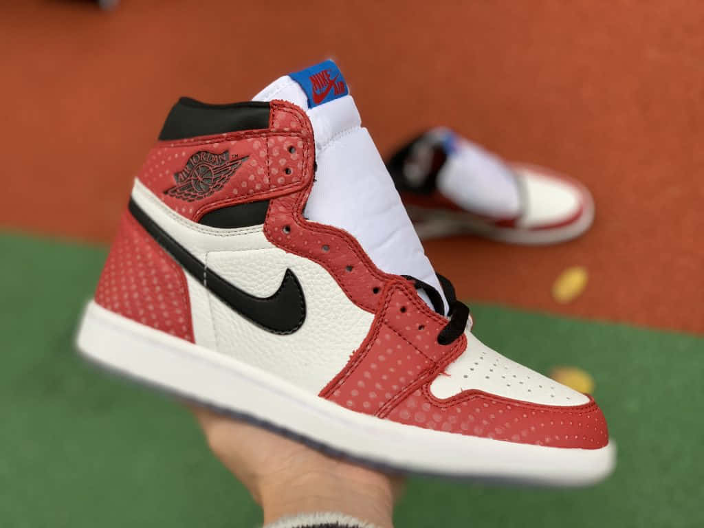 Red Nike® Jordan Shoes - Make A Statement In Style Background